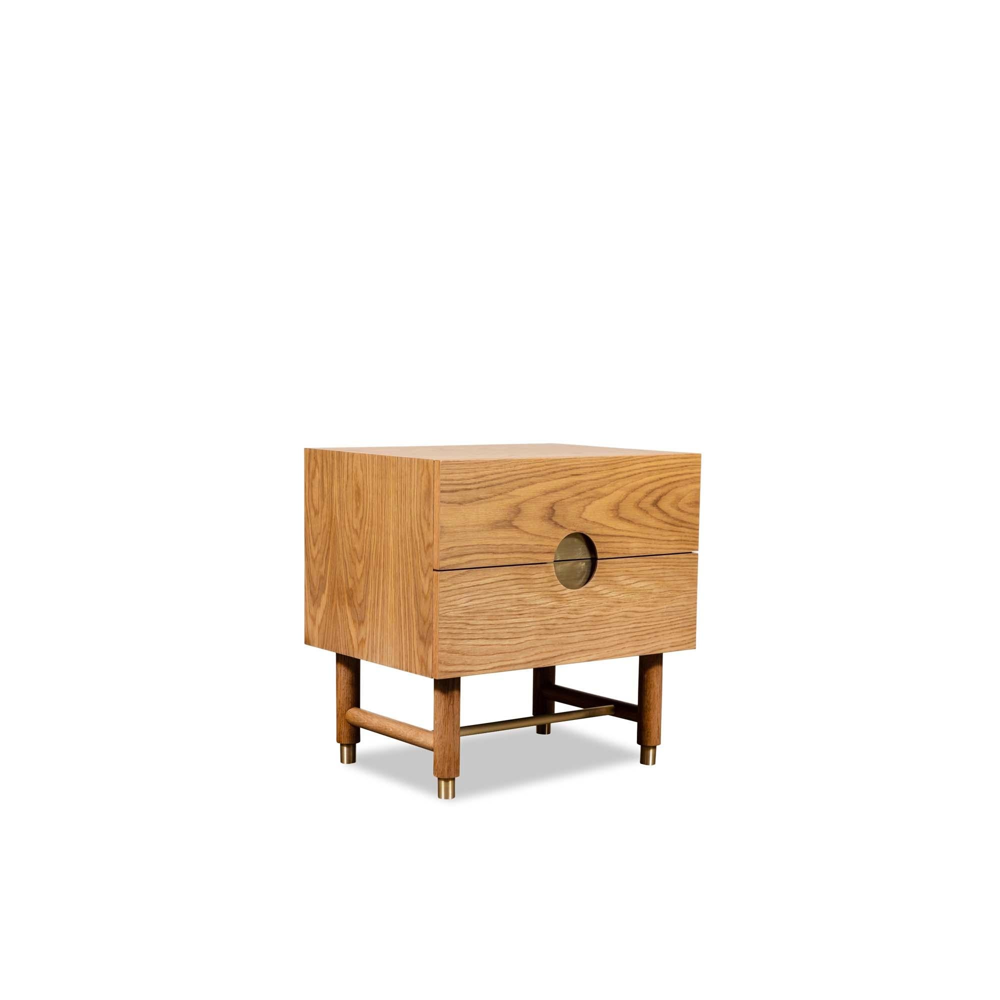 The Niguel Nightstand features two drawers. Details include leveling brass cap feet, a brass stretcher on the base, lacquered interior and inset brass hardware. Shown here in oiled oak.

The Lawson-Fenning Collection is designed and handmade in
