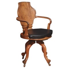 Antique Oak office revolving desk chair
