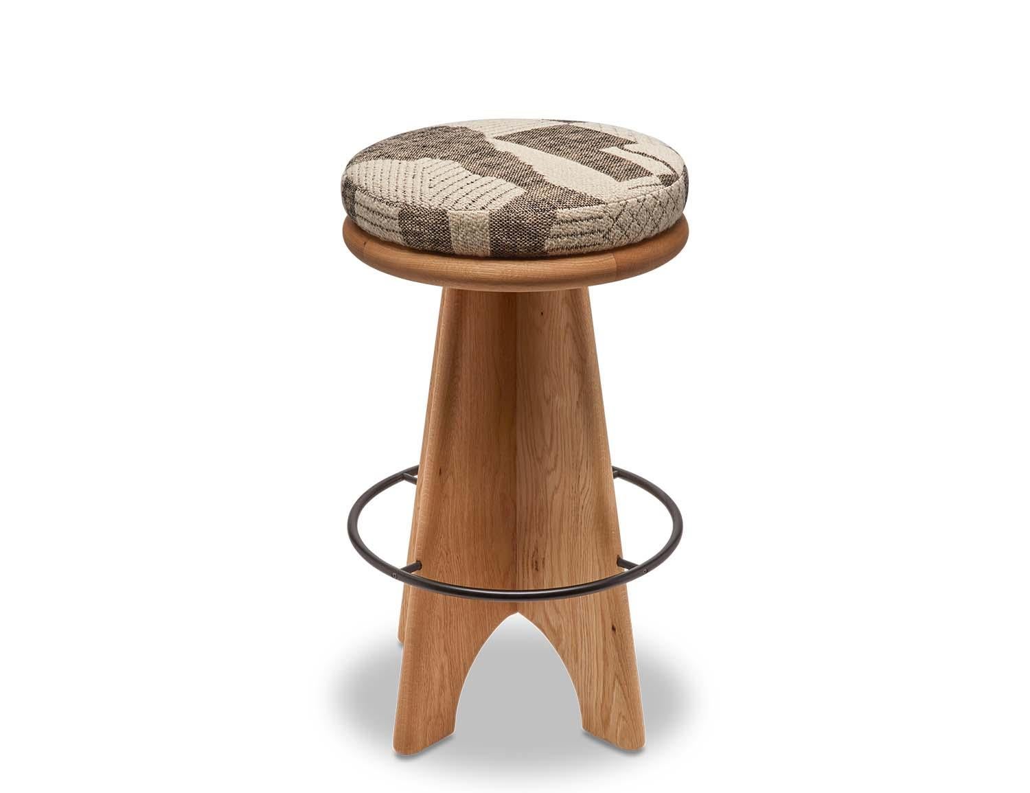 Oak Ojai Swivel Barstool by Lawson-Fenning. The Ojai Barstool features a sculptural wood base, powdercoated metal footrest and an upholstered swivel seat.

The Lawson-Fenning Collection is designed and handmade in Los Angeles, California. Reach out