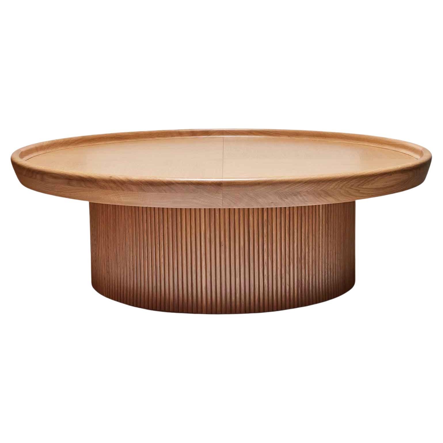 Oak Ojai Coffee Table by Lawson-Fenning. The Ojai coffee table features a round top with marquetry and a drum-shaped base with tambour details. Available in American walnut or white oak. 

The Lawson-Fenning Collection is designed and handmade in
