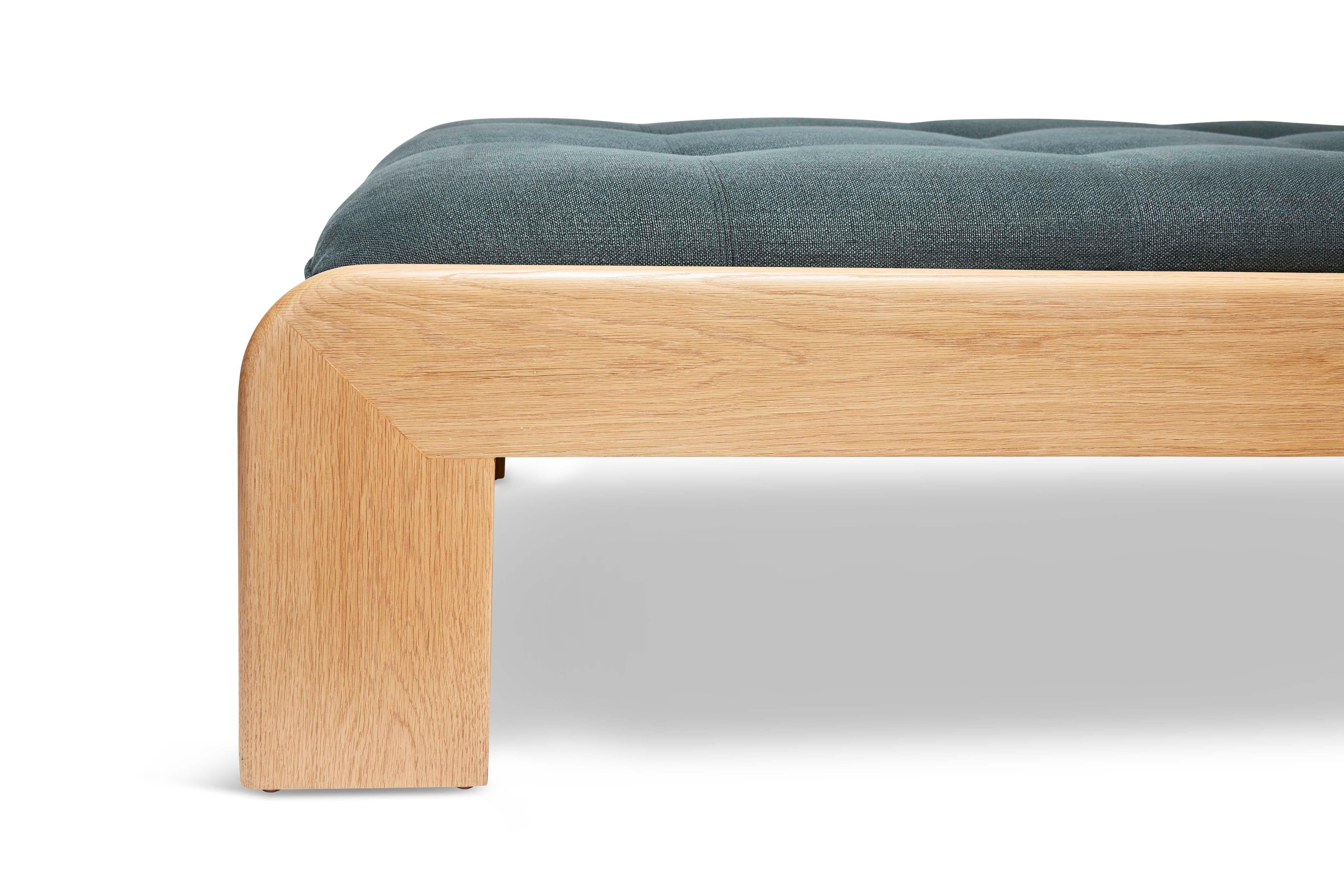 Oak Topa Daybed by Lawson-Fenning. The Topa daybed features a round over frame handcrafted in American walnut or white oak. The daybed is tufted and comes with a loose bolster pillow. 

The Lawson-Fenning Collection is designed and handmade in Los