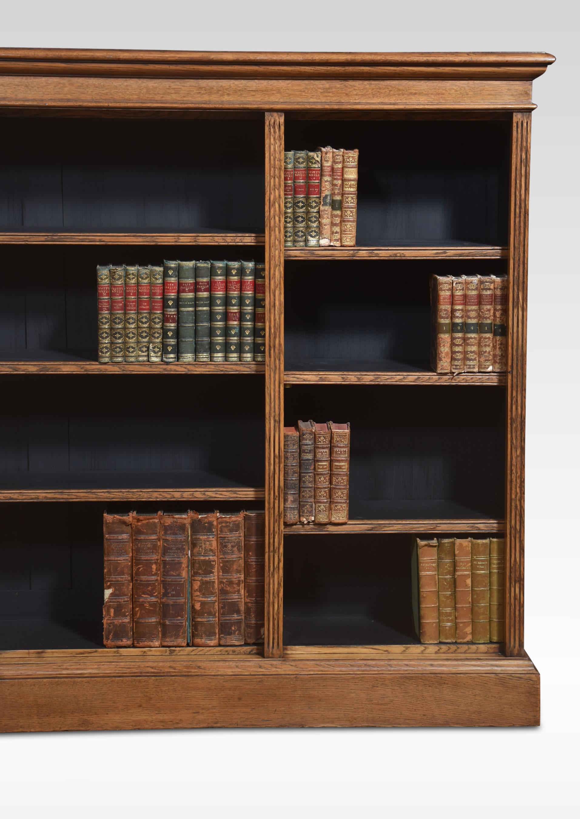 British Oak open bookcase For Sale