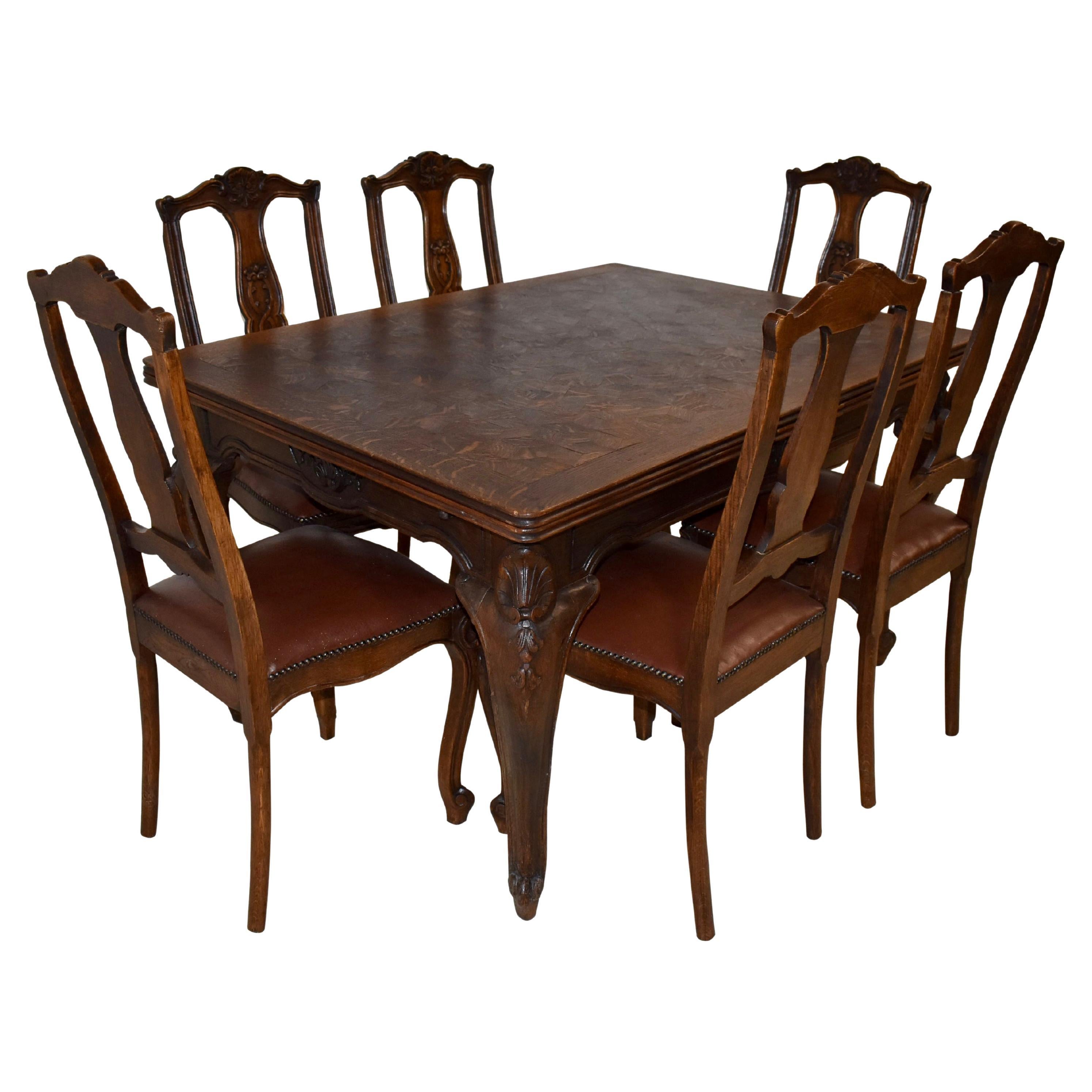 Oak Parquet Draw-Leaf Dining Table and Upholstered Chairs, Seven Piece Set For Sale