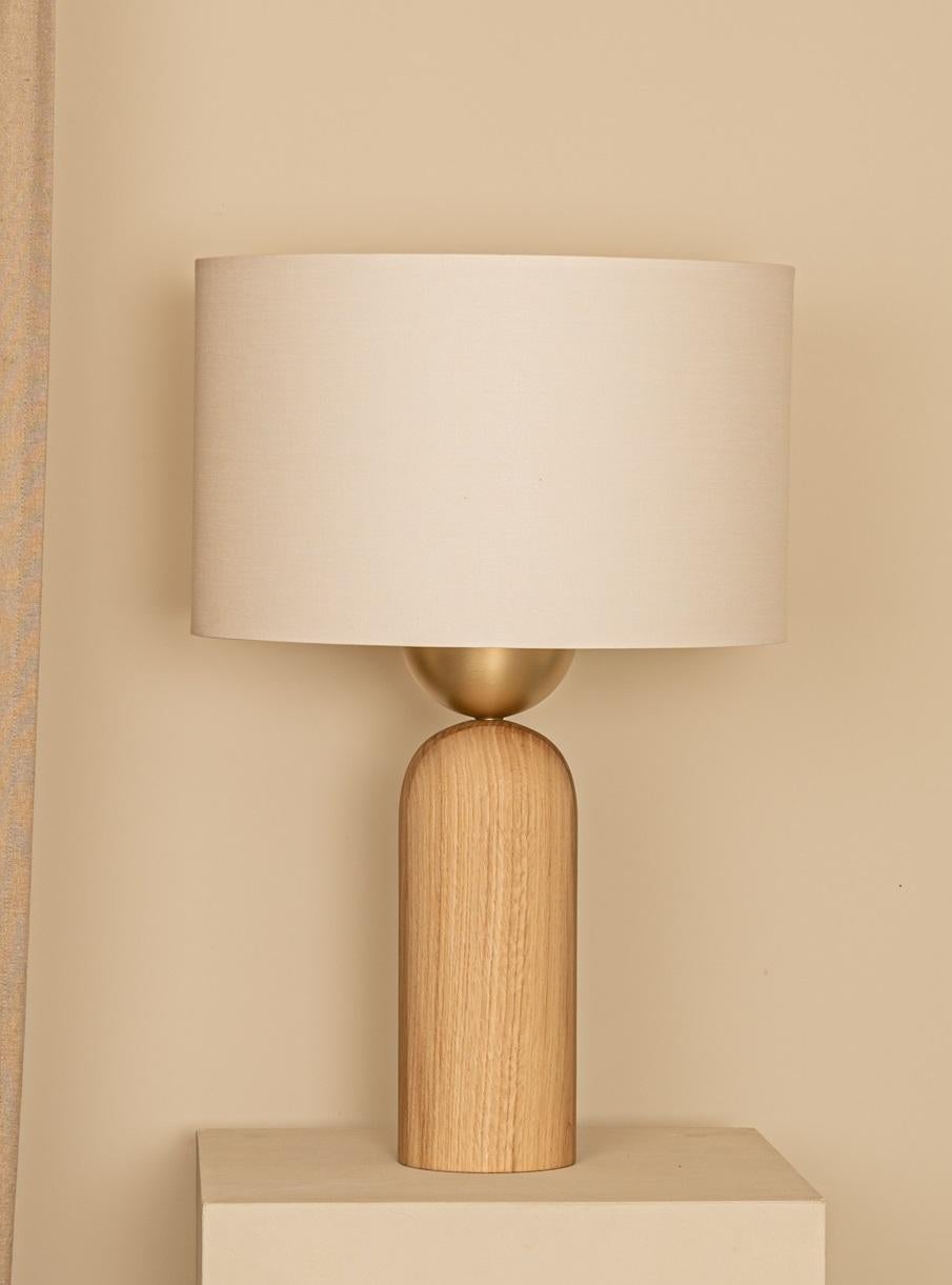 Oak Peona Table Lamp by Simone & Marcel
Dimensions: Ø 40 x H 61 cm.
Materials: Brass, cotton and oak wood.

Also available in different marble, wood and alabaster options and finishes. Custom options available on request. Please contact us. 

All