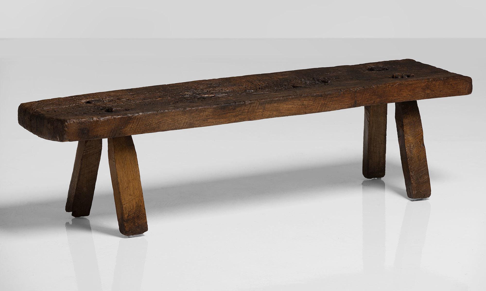 Oak Pig Bench, England circa 1790.

Primitive form with substantial slab top and legs.