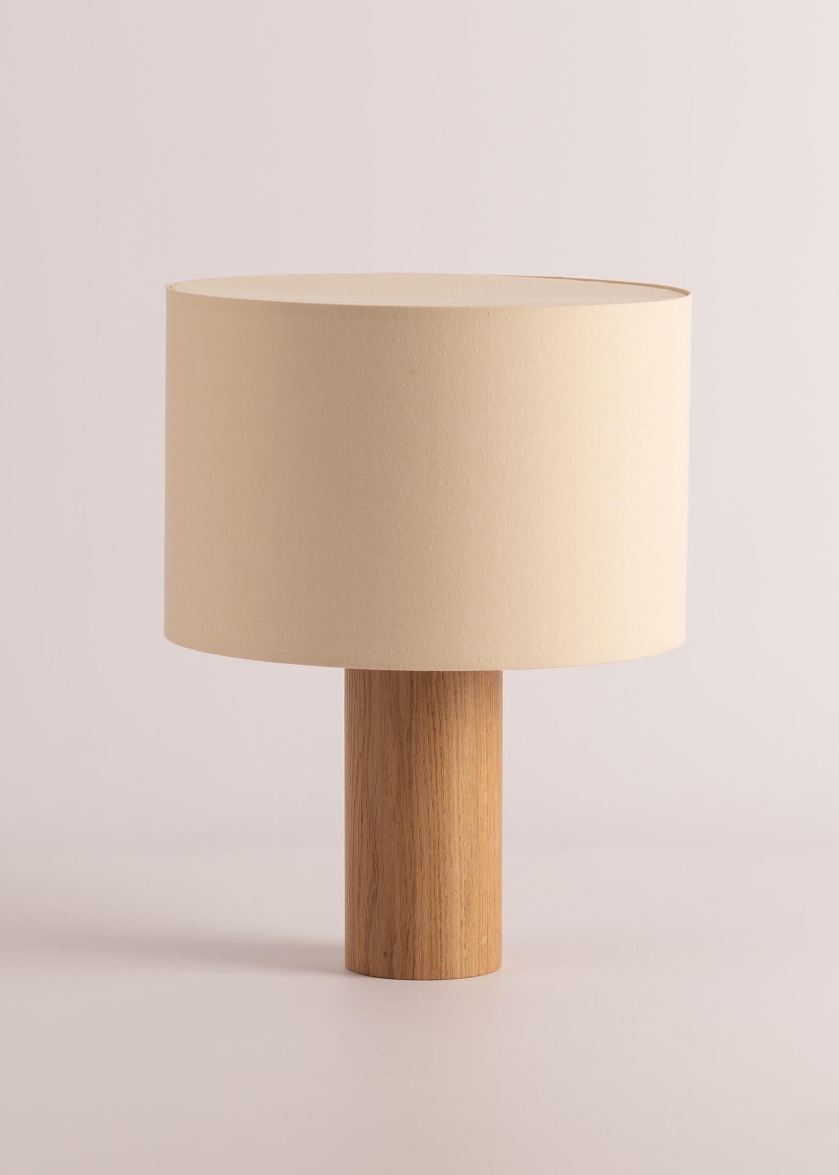 Oak Pipito Table Lamp by Simone & Marcel
Dimensions: Ø 30 x H 40 cm.
Materials: Cotton and oak.

Also available in different marble and wood options and finishes. Custom options available on request. Please contact us. 

All our lamps can be wired