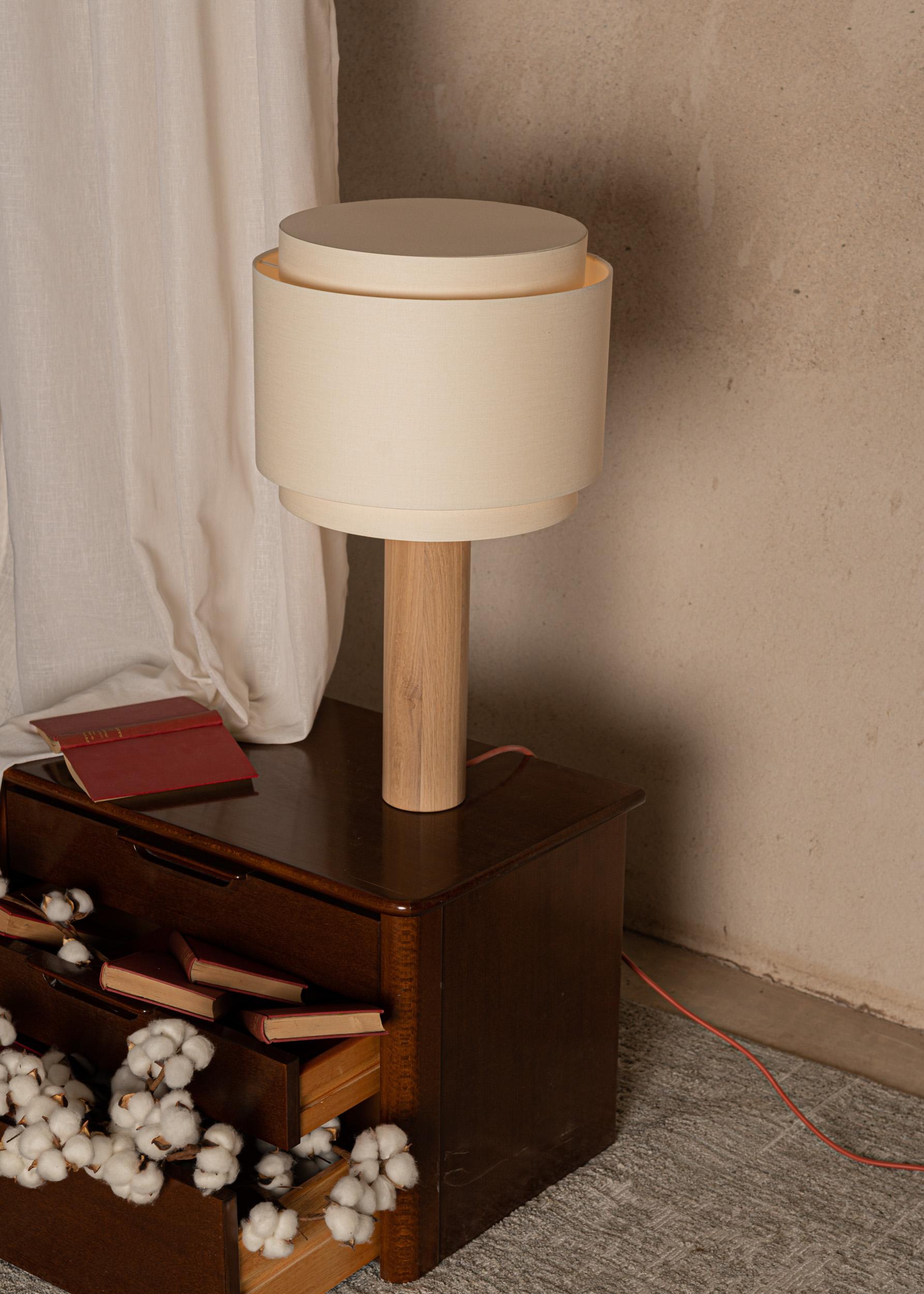 Oak Pipo Duoble Table Lamp by Simone & Marcel
Dimensions: D 35 x W 35 x H 60 cm.
Materials: Cotton and oak.

Also available in different marble and wood options and finishes. Custom options available on request. Please contact us. 

All our lamps