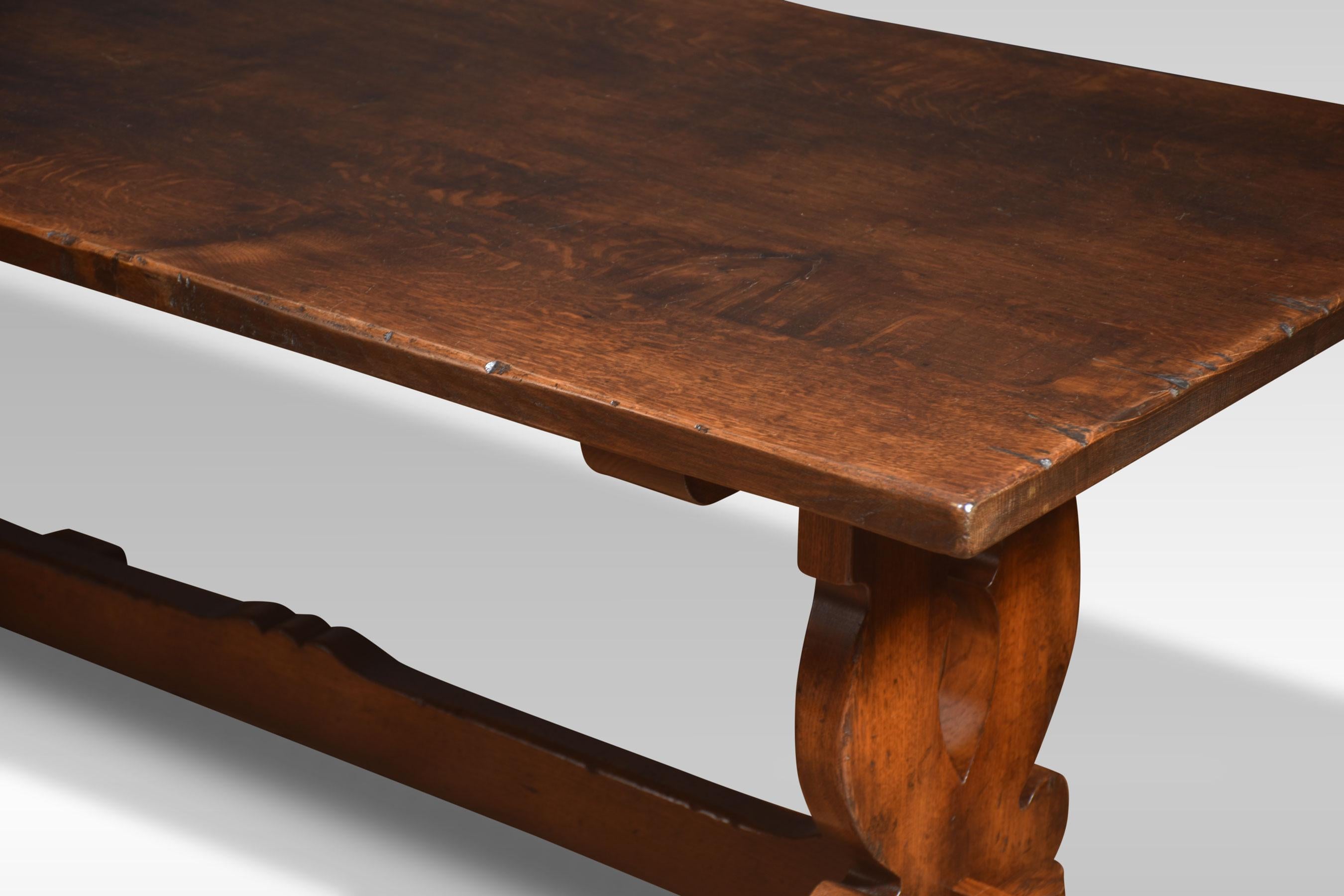 Large Oak refectory table, the plank top, raised on trestle ends united by stretcher.
Dimensions
Height 30 Inches
Width 72 Inches
Depth 33 Inches