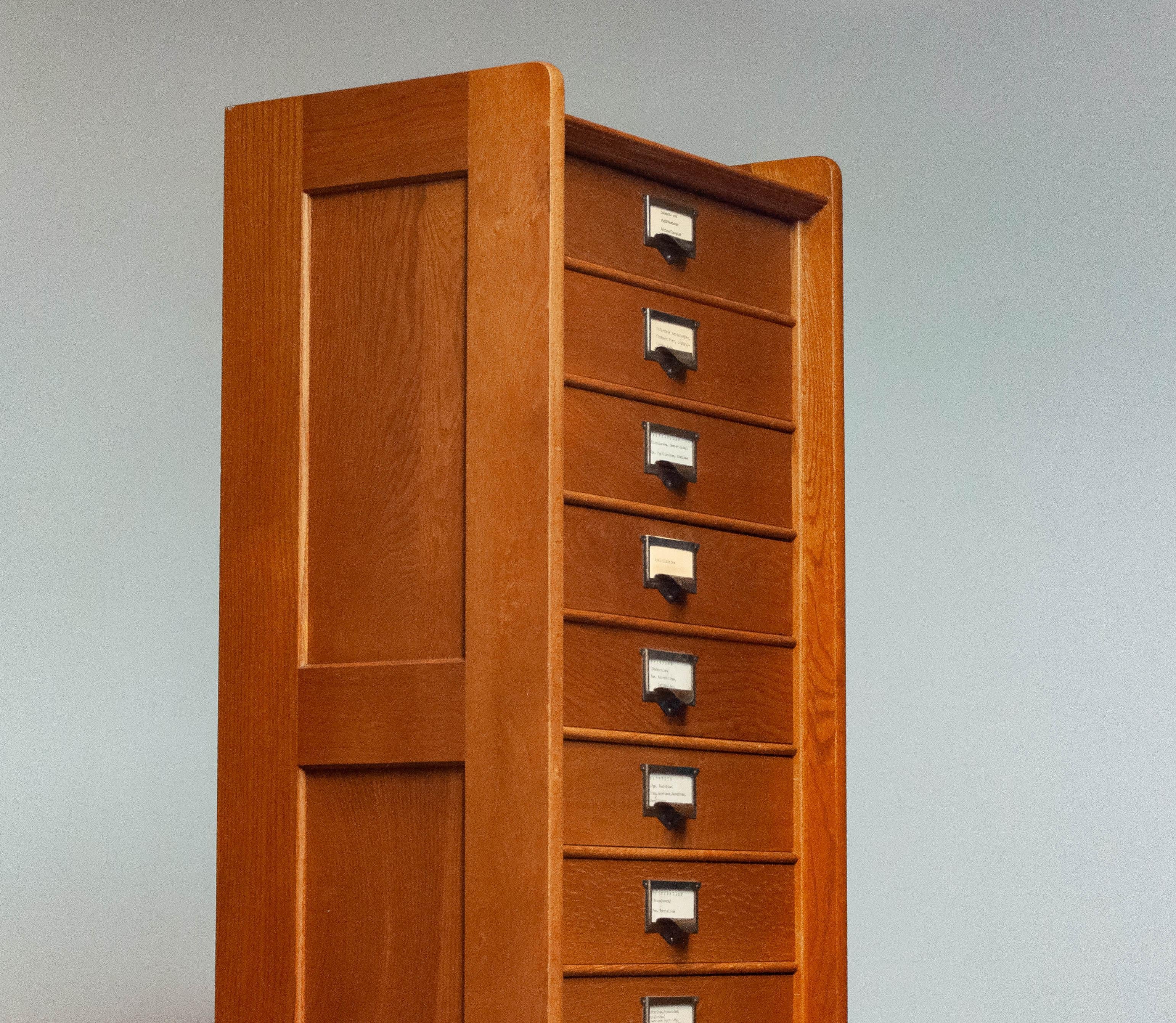Absolutely beautiful and high quality drawer ( 15 drawers ) office cabinet in made of solid oak in Colonial style by Åtvidabers Snickerfabrik Åtvidaberg in Sweden.
This formal archive or drawer cabinet is by the formal owner used for entomology and