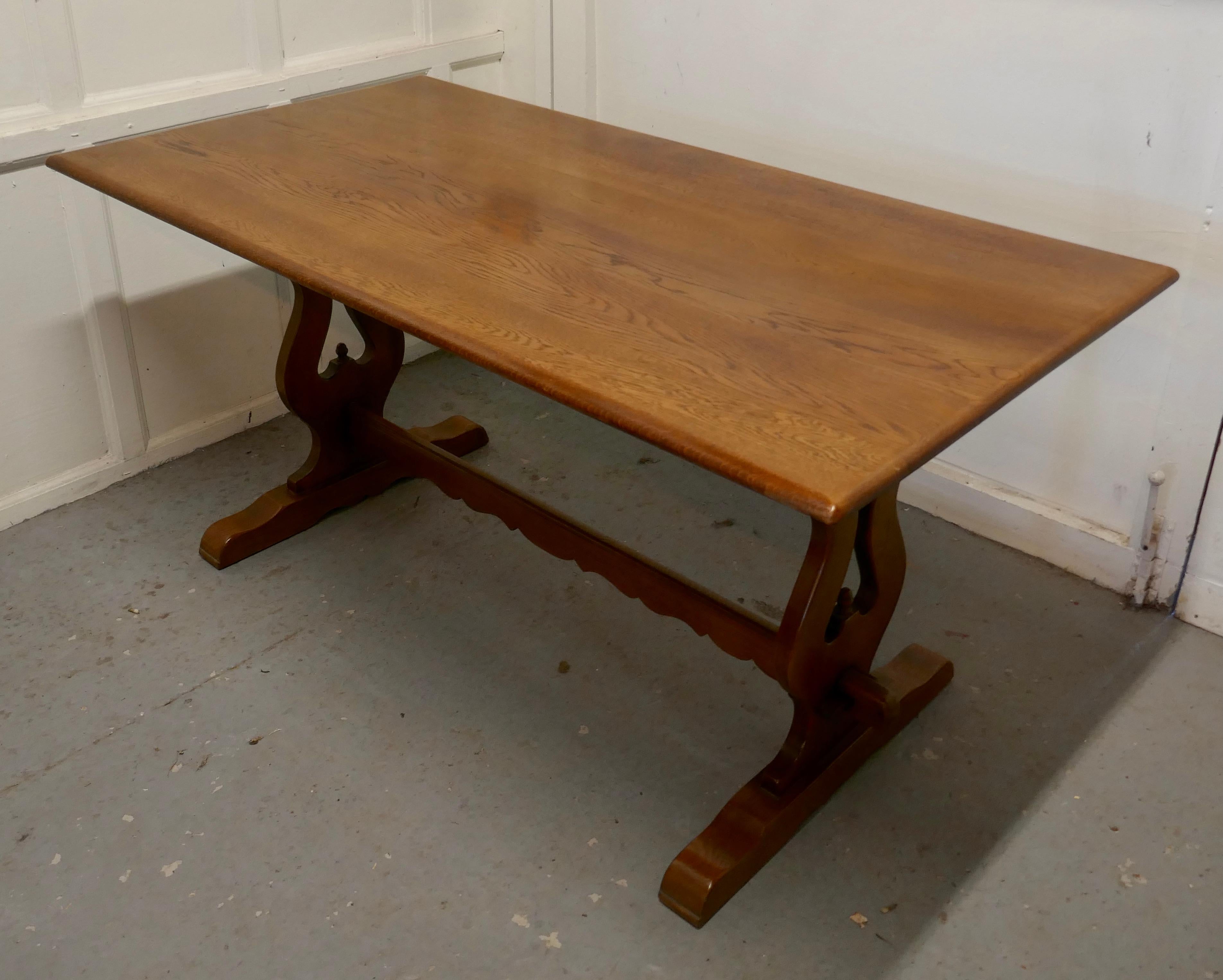 Oak Refectory table by Old Charm

This is a superb piece it is a good quality Oak Country table, a refectory style table, the top and legs are in oak 
 
The table is a beautiful deep colour, it has a good finish, it is sound and does not wobble,