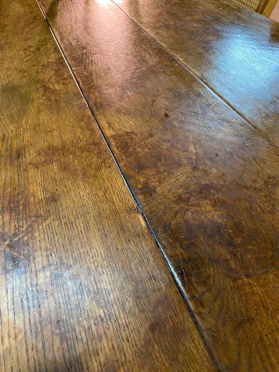 Oak refectory table and eight cane back dining chairs set 3

Fabulous antique 18th century style English Oak refectory table matched with eight caned back dining chairs, the detachable thick plank top, raised on fluted cup and cover baluster