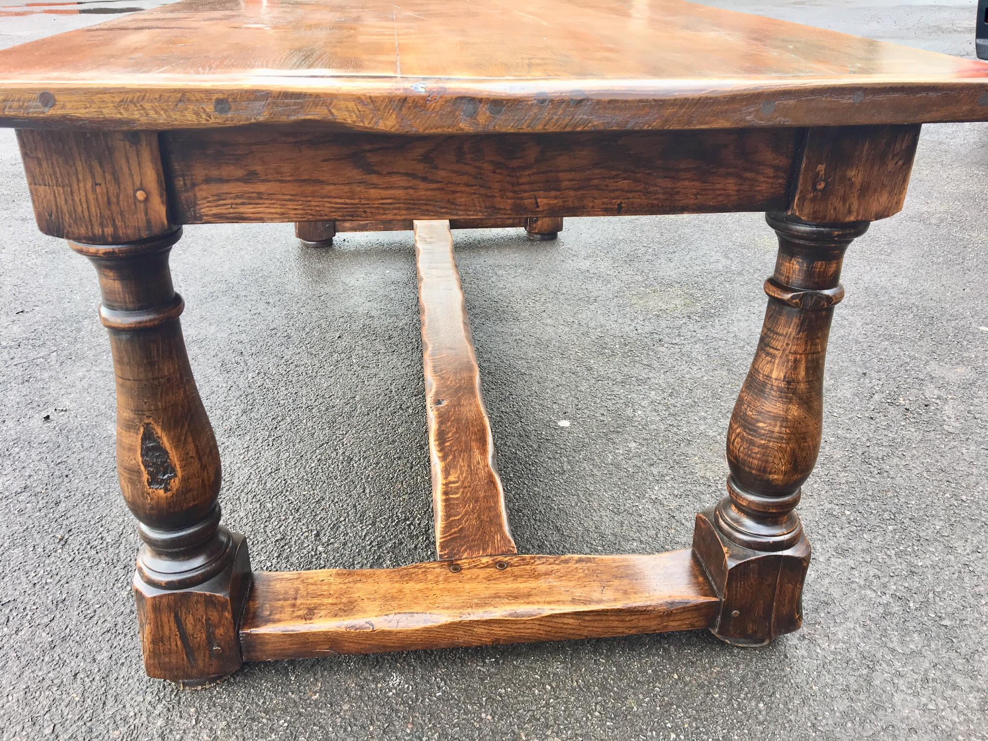 Good traditional oak table made from English oak in the 1920s. This attractive family dining table
is shown here in excellent condition, having been refurbished in our workshop. All the joints are firm
and the table has been cleaned and waxed to