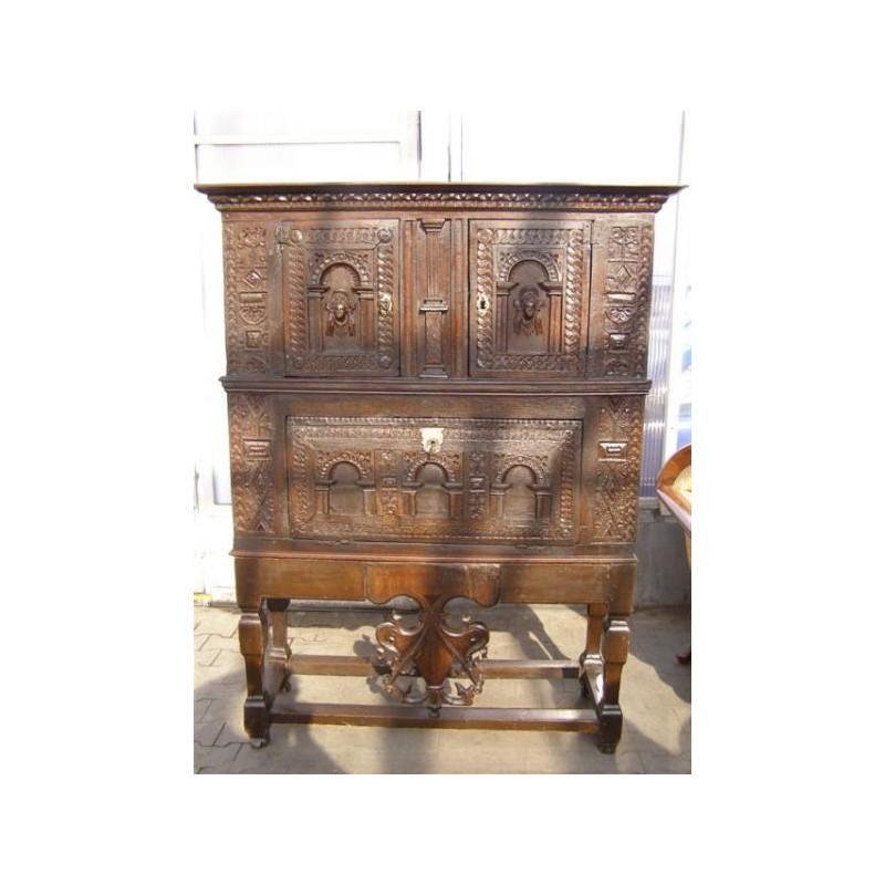 Cabinet  We present you a unique Renaissance Cabinet from the sixteenth century, Kabinet comes from Germany. It is made of  oak. Cabinet is a box furniture, it consists of an upper chest and a base which consists of legs and coat of arms. The