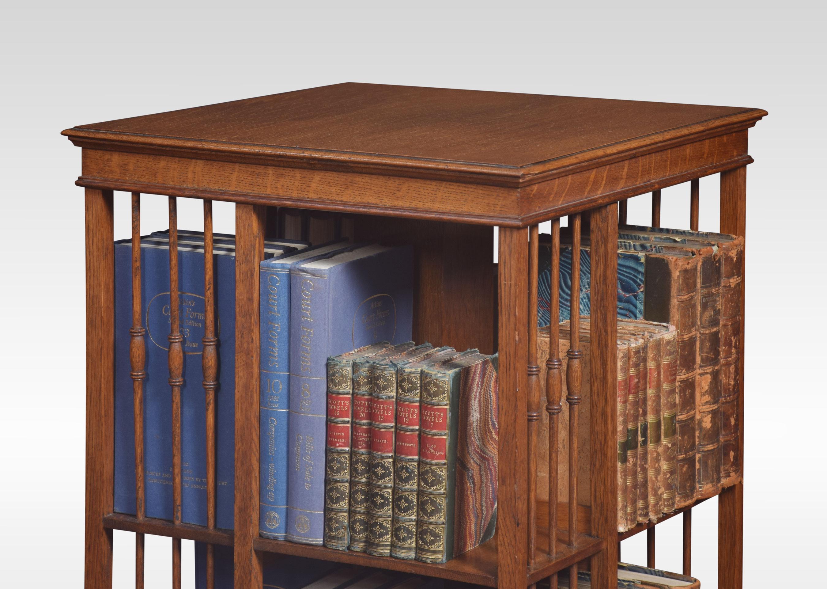 Oak revolving bookcase the square top with molded edge, above an arrangement off shelves raised up on platform base terminating in cabriole legs.
Dimensions
Height 34.5 inches
Width 19.5 inches
Depth 19.5 inches.