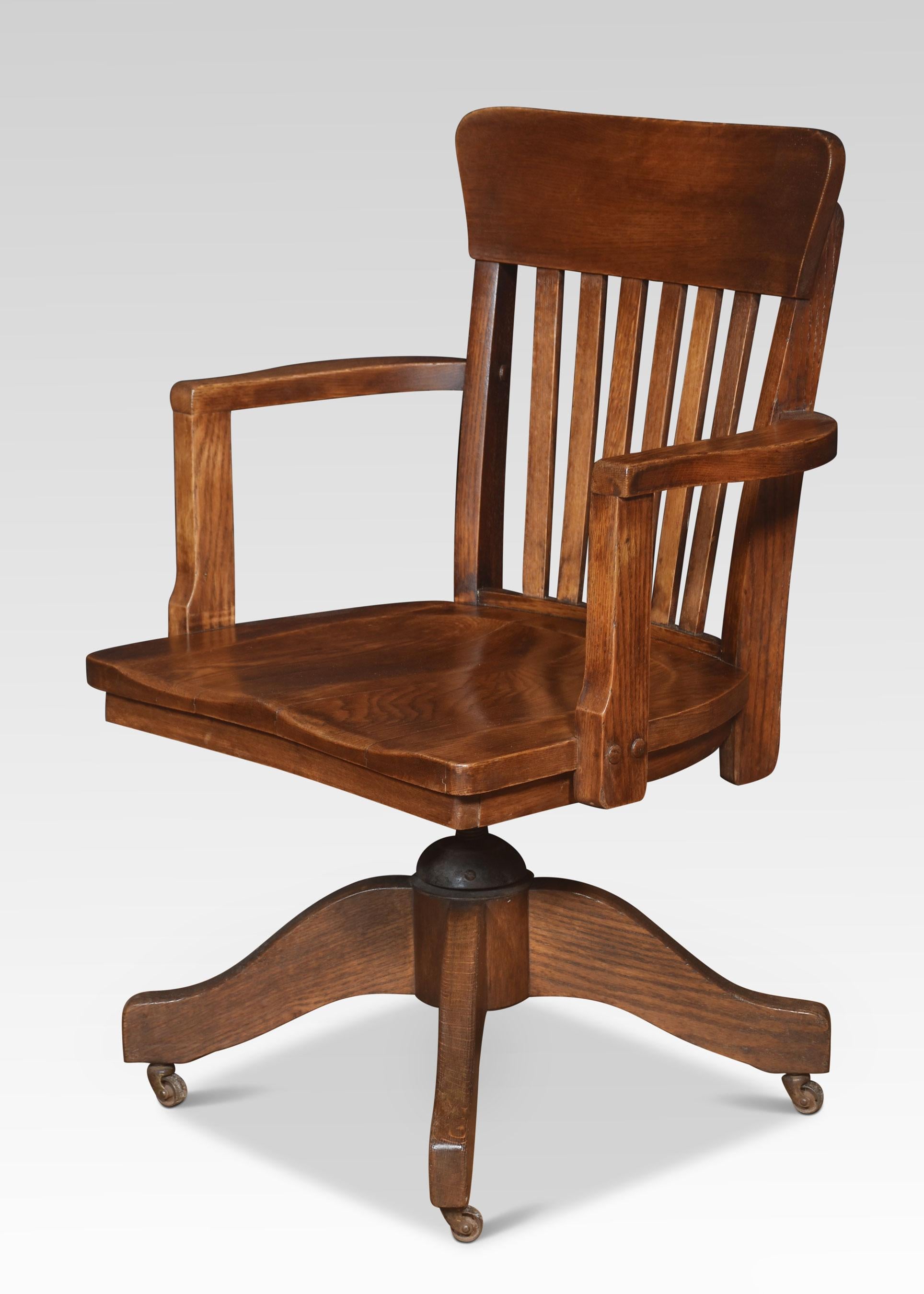 British Oak revolving desk chair For Sale