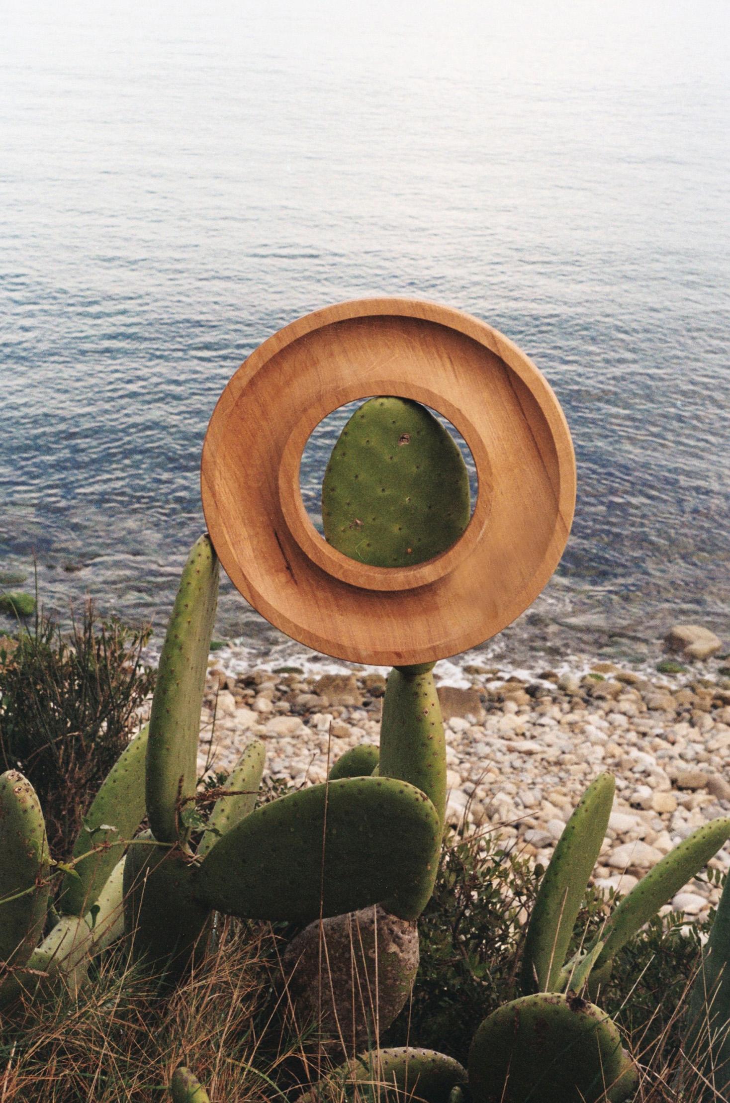 The oak ring tray is a minimalist style round shaped centerpiece made of treated Oak, manufactured according to traditional methods.