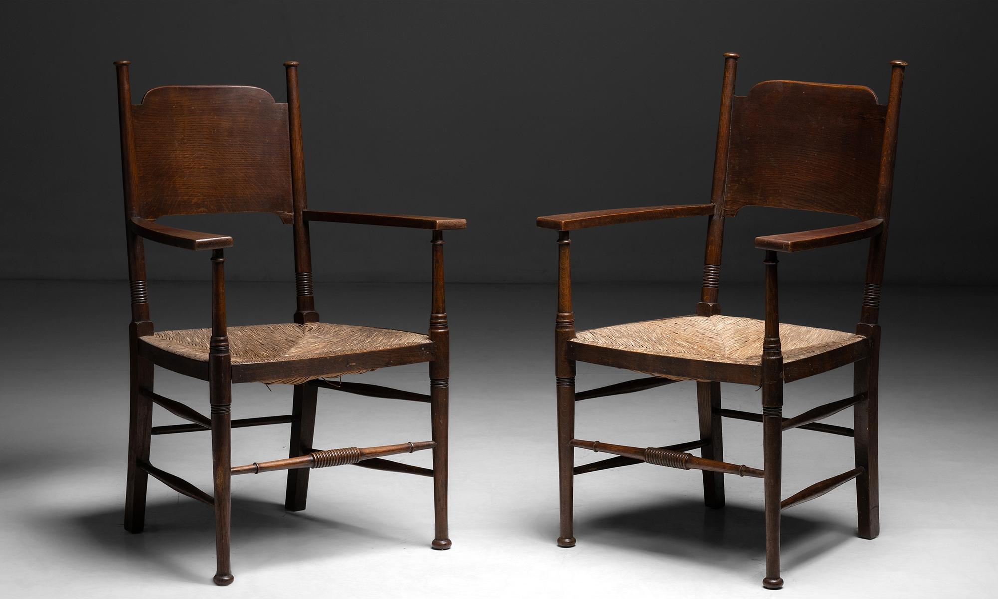 Oak & rush armchairs by William Birch

England circa 1890

Hand crafted oak frame with original rush seats.

Measures: 25.75” W x 19.5” D x 41” H x 18.25”seat.


