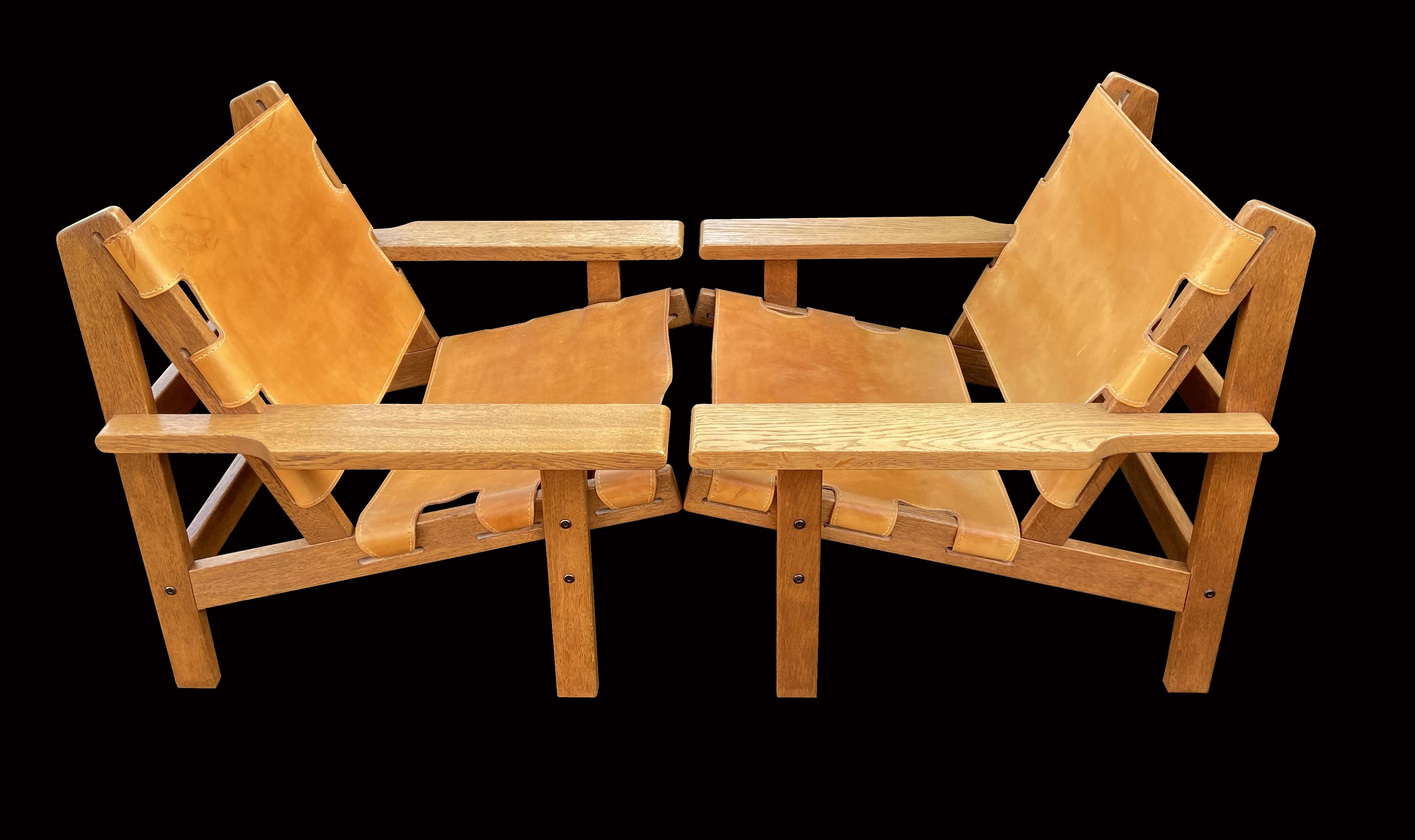 A very fine pair of these scarce chairs by Kurt Ostervig, Very much in the same vein as Borge Mogensen Spanish Chairs, in solid Oak and Cognac saddle leather.