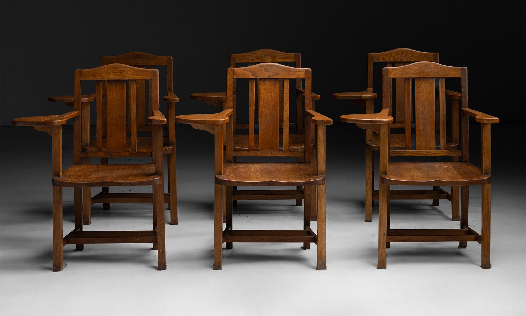 Oak Scholars Chairs

England circa 1930

Originating from Oxford University.

28”w (arm up) x 23.5”d (arm down) x 21”d x 37”h x 17”seat