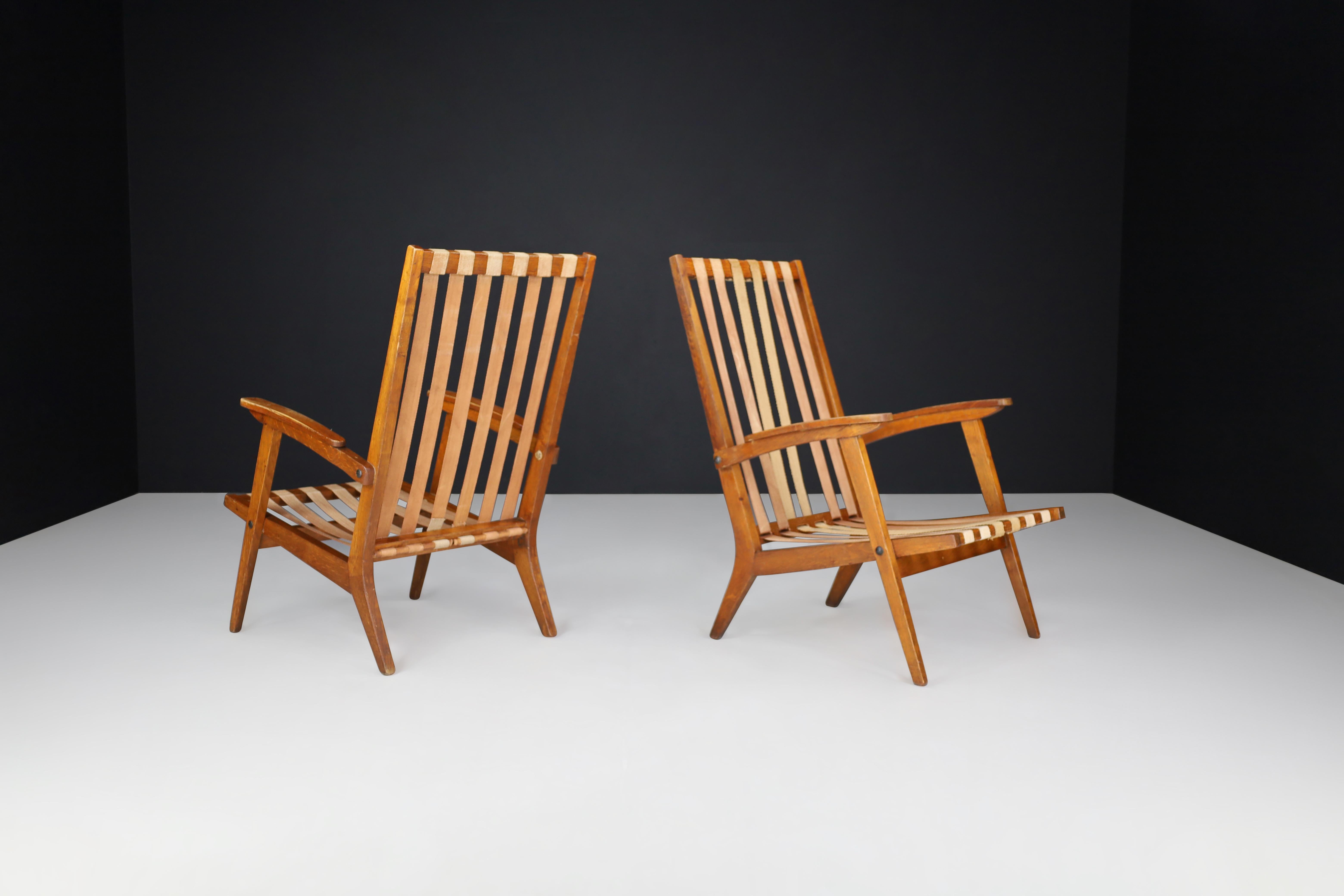 French Oak Sculptural Lounge Chairs with Brown Upholstery, France, 1950s For Sale