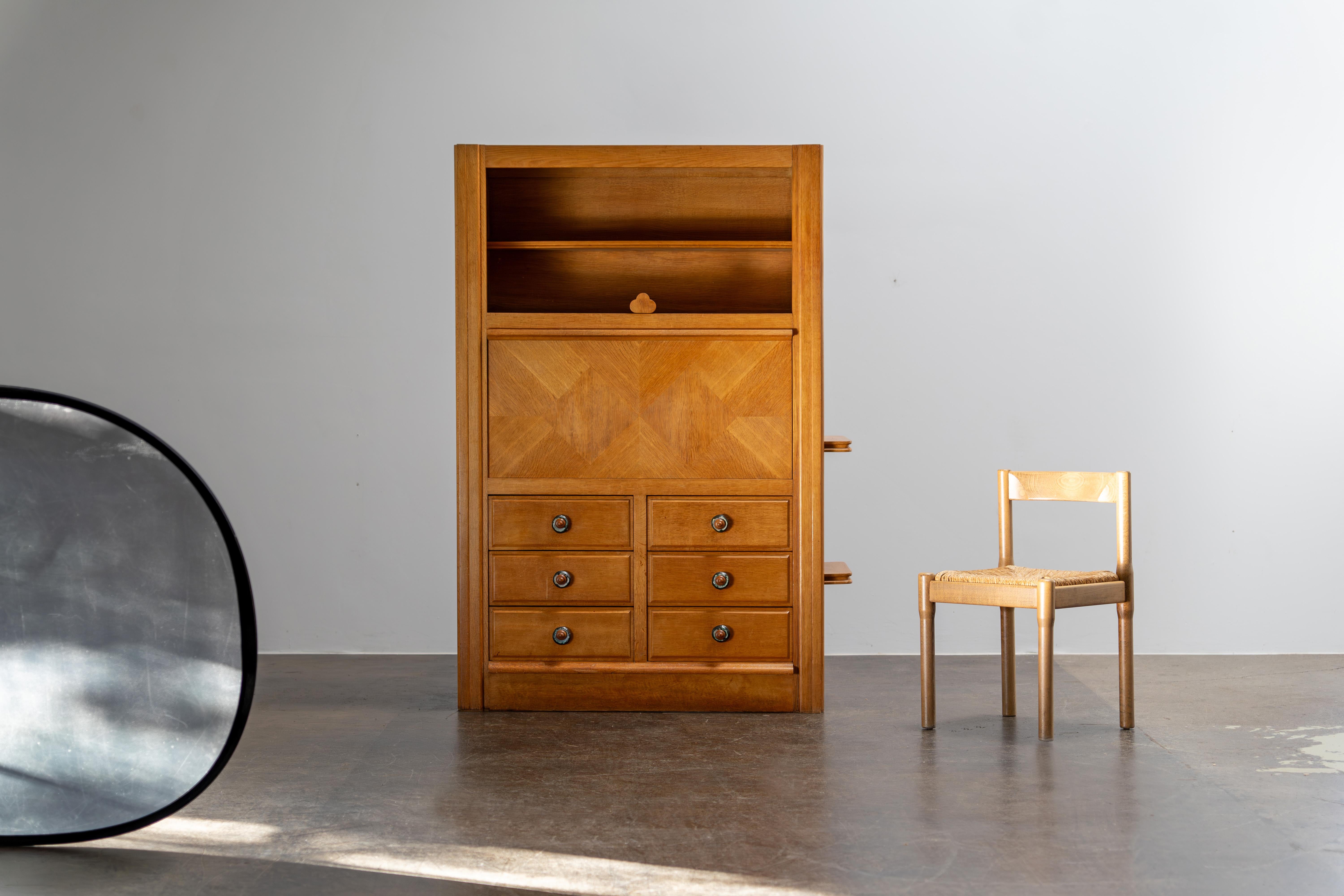 Guillerme et Chambron, 1960 secertary cabinet with ceramic handles by Boleslaw Danikowski. Votre Maison Edition.

We can organize fast shipping for competitive prices. Please contact us for info to your location.