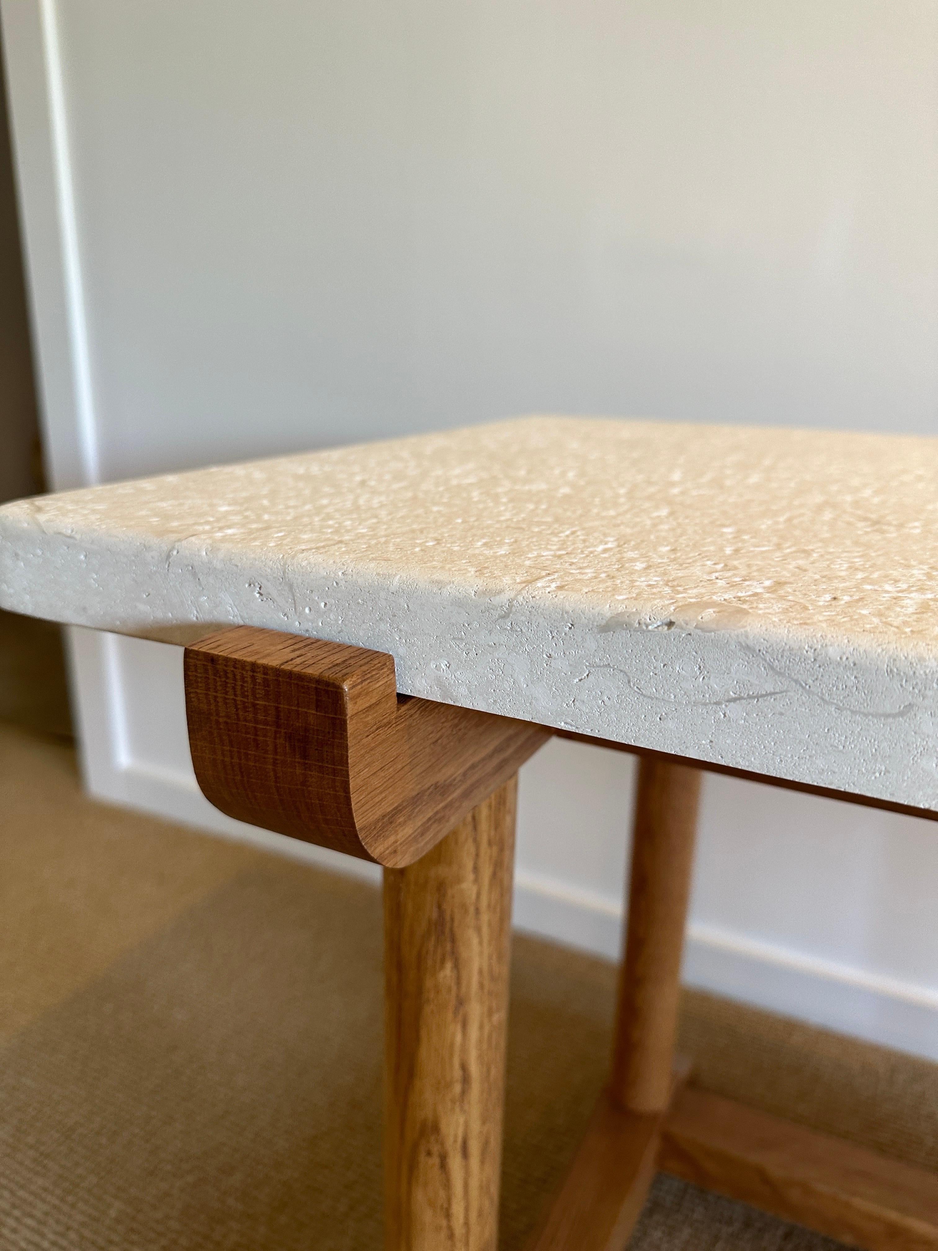 This lovely side table in oak with a thick limestone plateau is heavy and sturdy. A PAIR is available if you need two, otherwise sold individually.  THIS ITEM IS LOCATED AND WILL SHIP FROM OUR EAST HAMPTON, NY SHOWROOM.