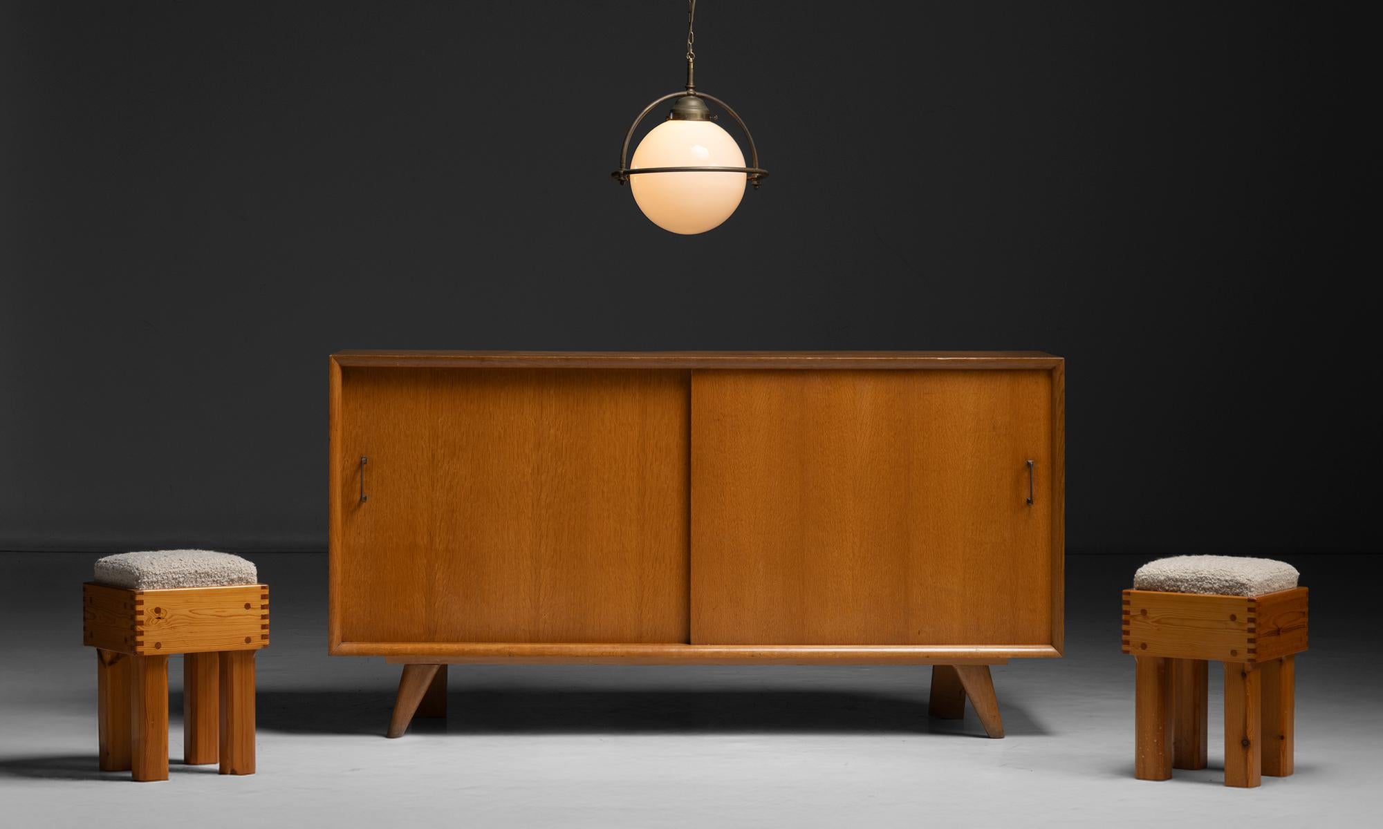 France, 1950
Sleek elm sideboard with sliding doors, spacious interior, and brass handles.
70.75”L x 19.75”d x 37.5”h
Ref. MOD1151
$ 7,800
