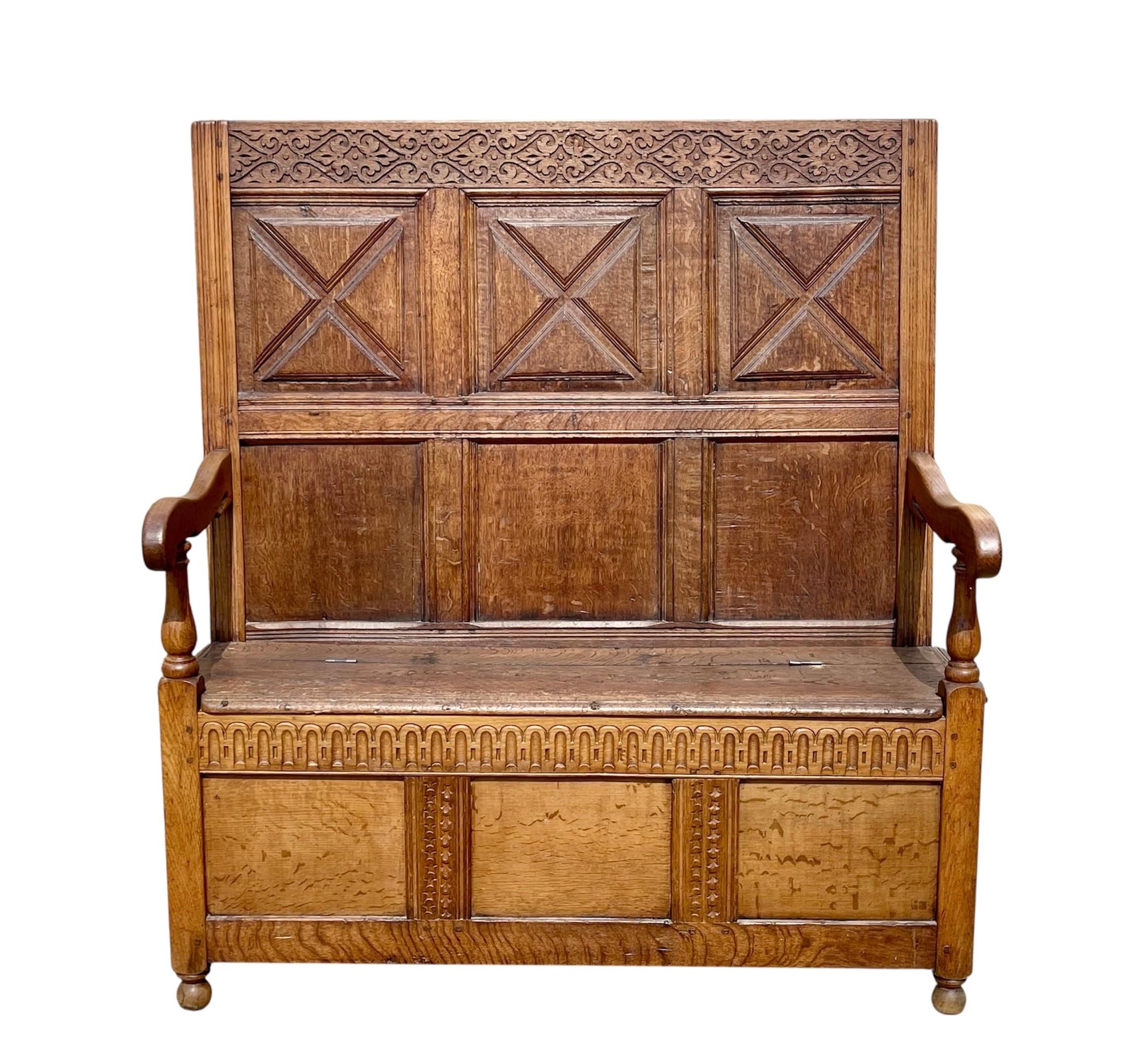 Rustic Renaissance style carved blond oak chest bench in good condition. Dates from the early 19th century. 
 
 Dimensions
 Height 1m38 
 Seat height 52cm 
 Lenght 1m24 
 Depth 53cm