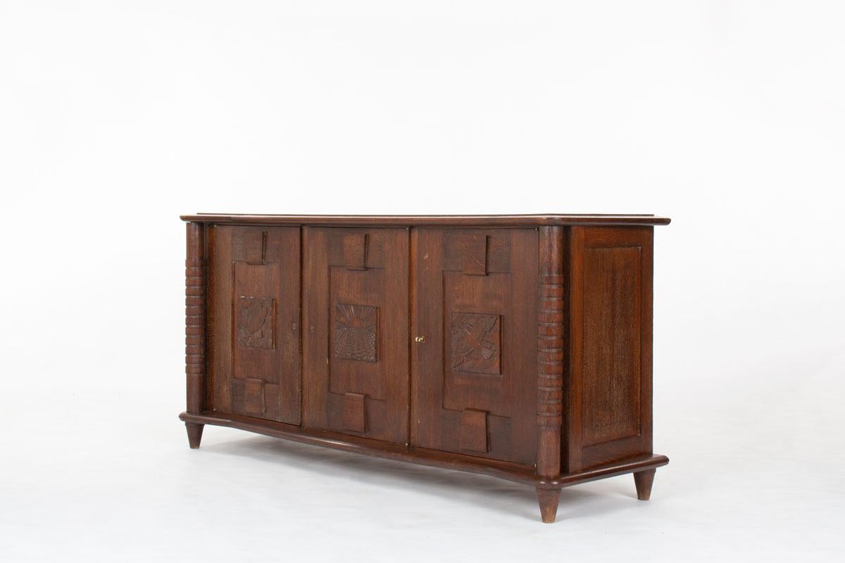 Unità di stoccaggio degli anni '50
Alla maniera delle creazioni di Joseph Savina
Il tutto in Oak tinto
3 porte davanti
Bella patina