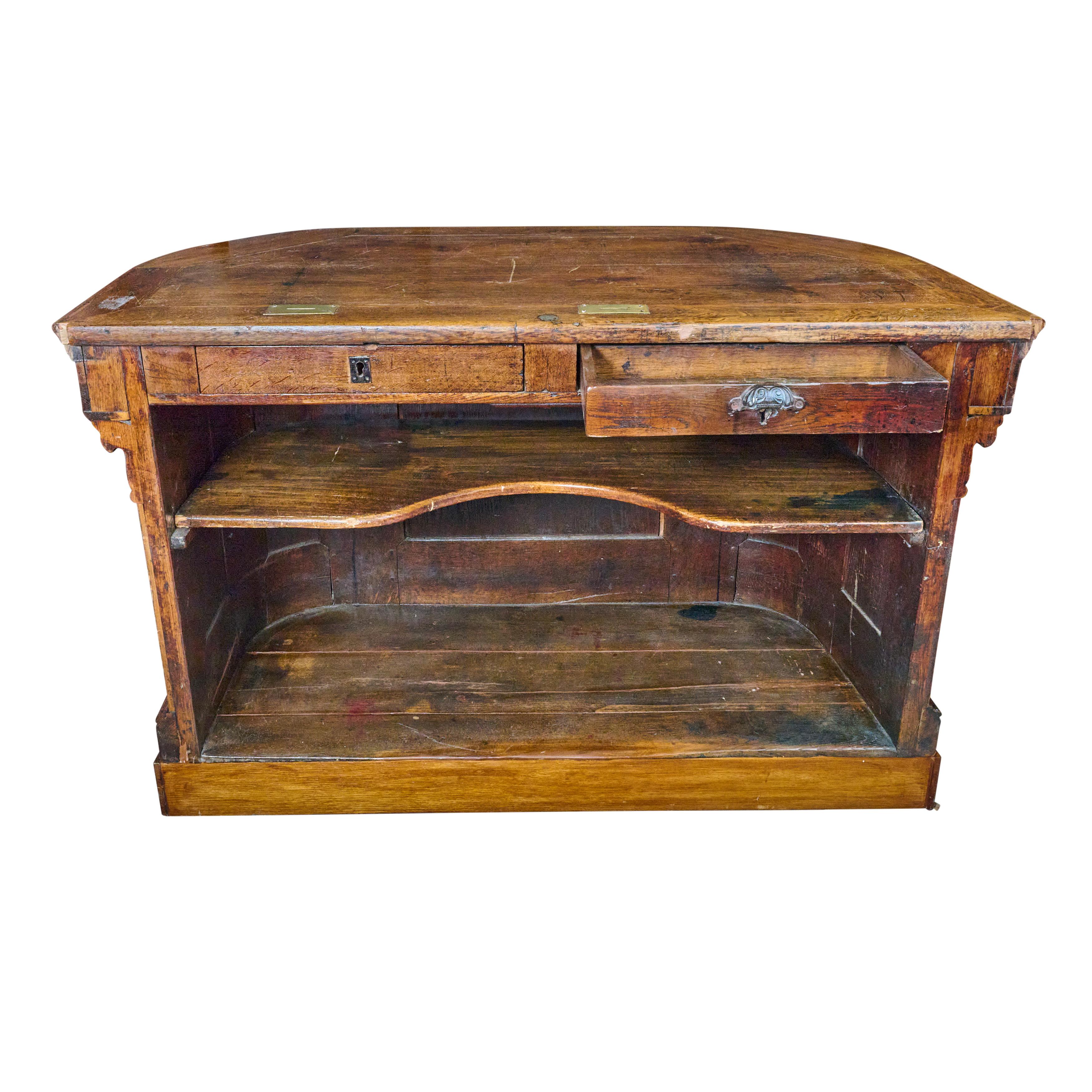 Oak Store Counter with Two Brass Slots for Money Storage  In Good Condition For Sale In Chicago, IL