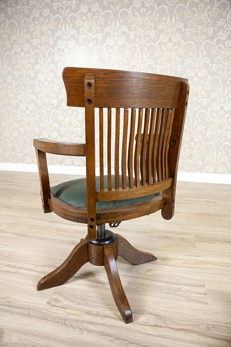 European Oak Swivel Desk Chair from the Early 20th Century with Green Leather Seat
