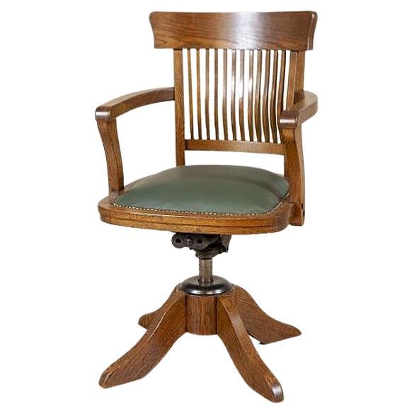 Oak Swivel Desk Chair from the Early 20th Century with Green Leather Seat