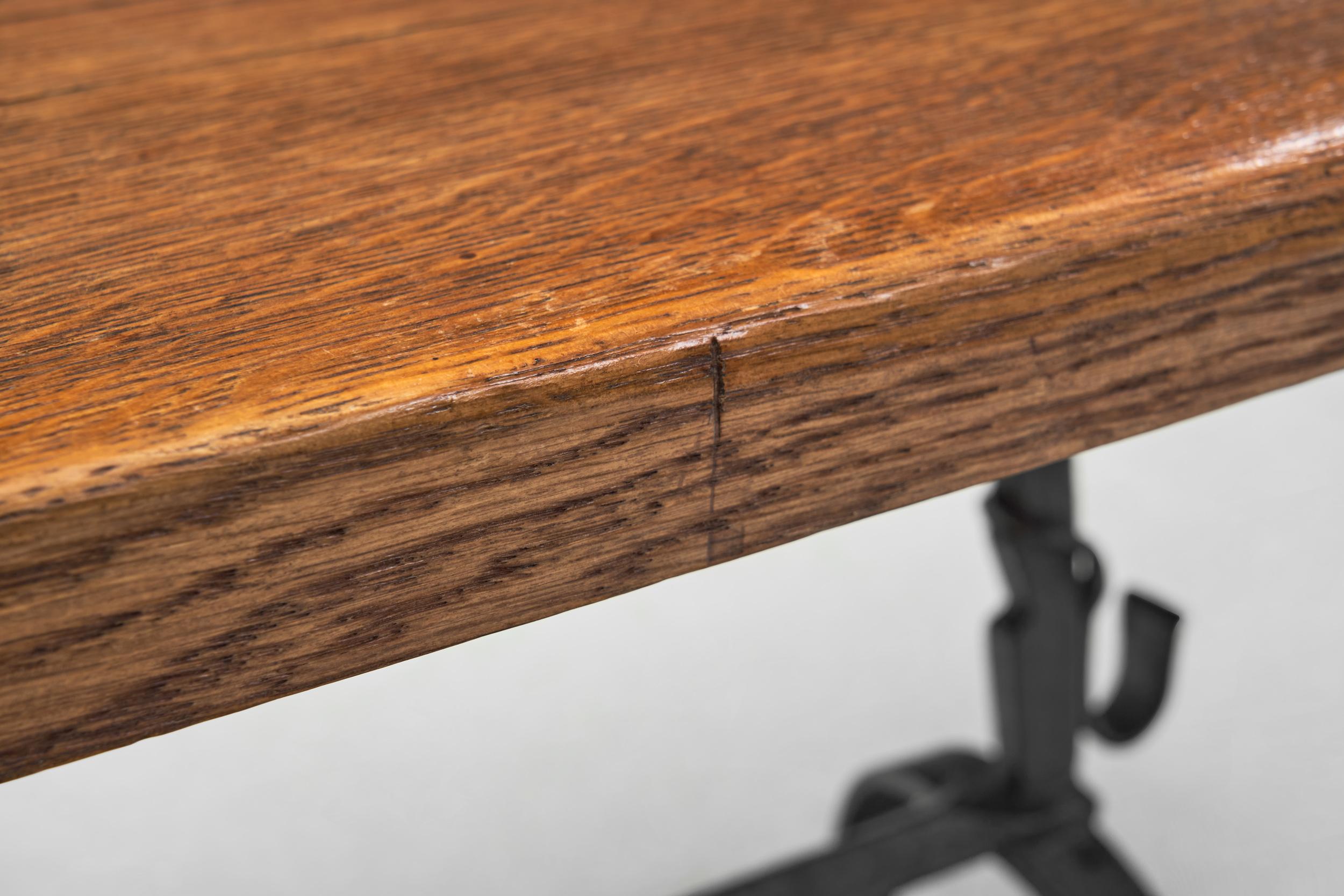 Oak Table with Iron Base in the manner of Jean Touret, France Mid-20th Century For Sale 6