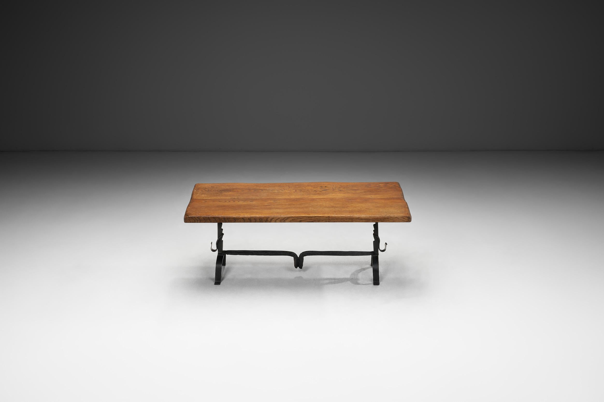 Mid-Century Modern Oak Table with Iron Base in the manner of Jean Touret, France Mid-20th Century For Sale
