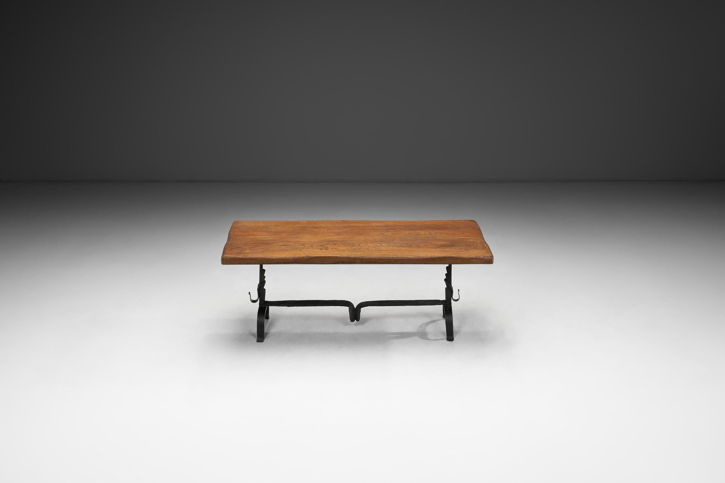 Oak Table with Iron Base in the manner of Jean Touret, France Mid-20th Century In Good Condition For Sale In Utrecht, NL