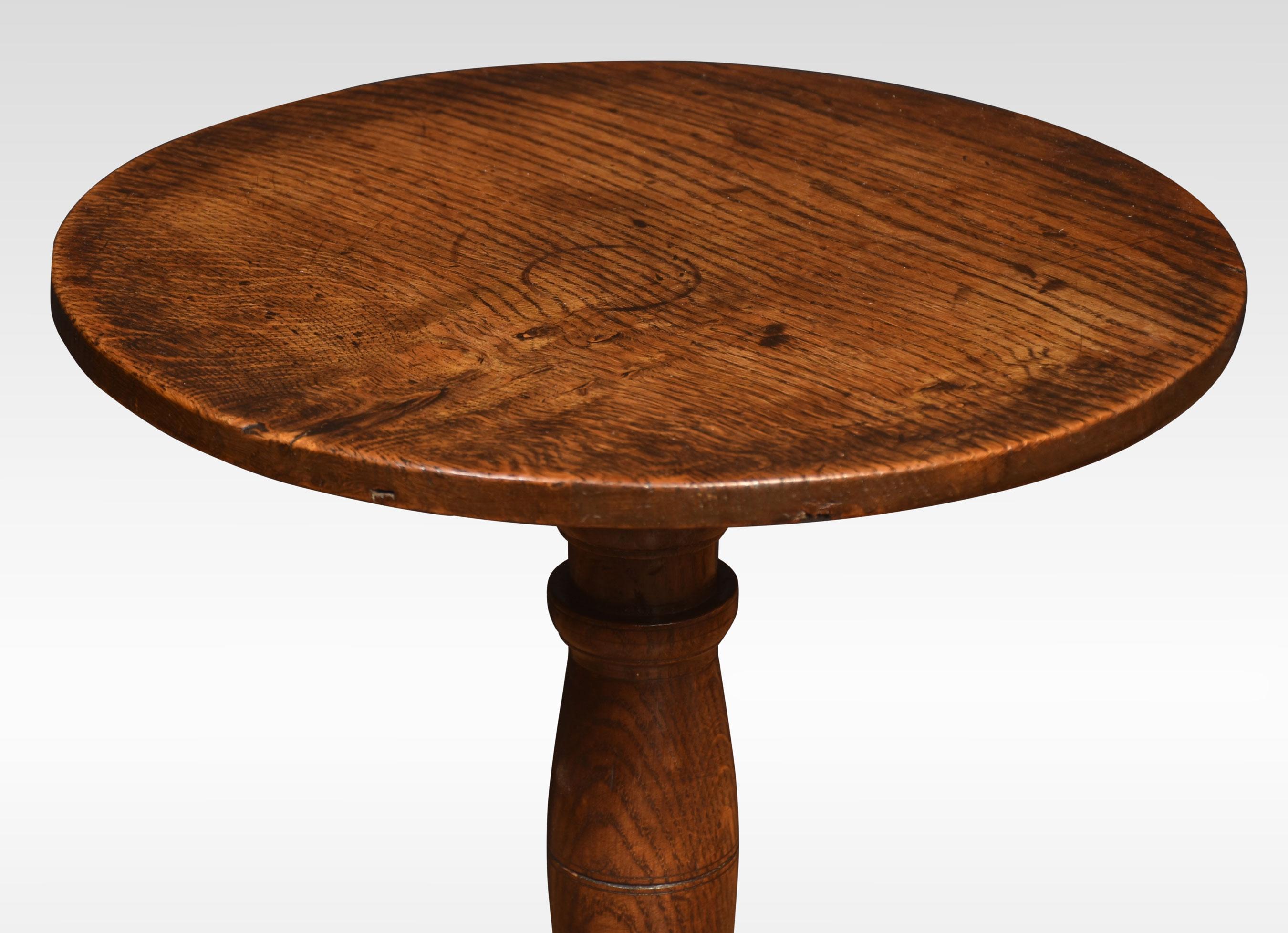 Oak tripod table of unusual form having a small circular top raised up on turned stem and three large cabriole supports.
Dimensions
Height 26 Inches
Width 22.5 Inches
Depth 22.5 Inches