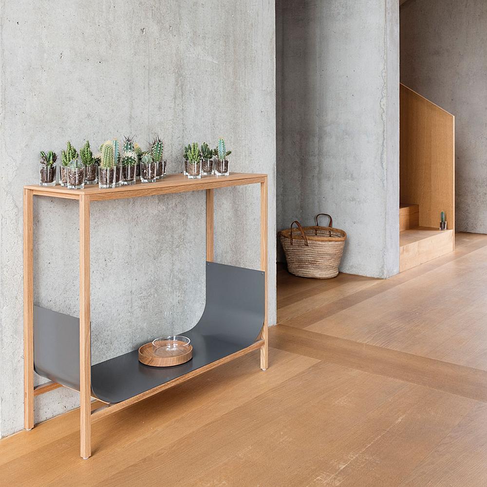 Oak /graphite
Dims: W 90 cm D 32cm H 80cm creative independence.
Original price: $1175
The TUB console table is all about the exciting interplay between right-angled corners and curved surfaces. Crafted from wood and metal, it makes a clear