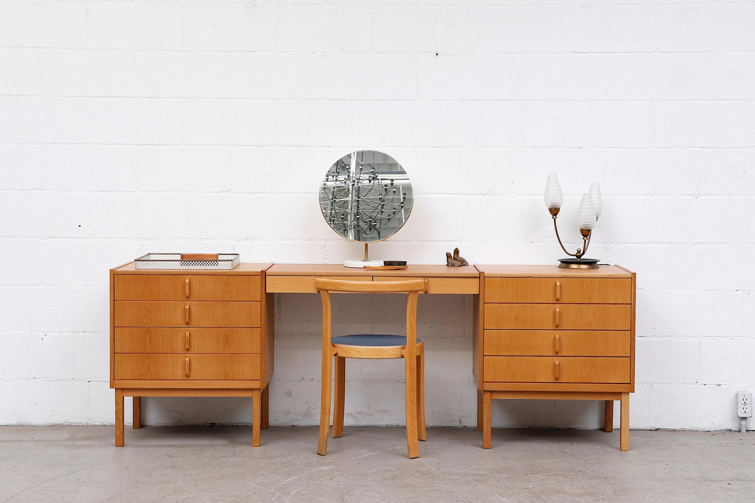 Lightly refinished, 3-piece- Bertil Fridhagen oak desk or vanity with stacked drawers and desk/vanity middle section. In original condition with wear and scratching consistent with age and use. Shown with Magnus Olesen series 8000 chair