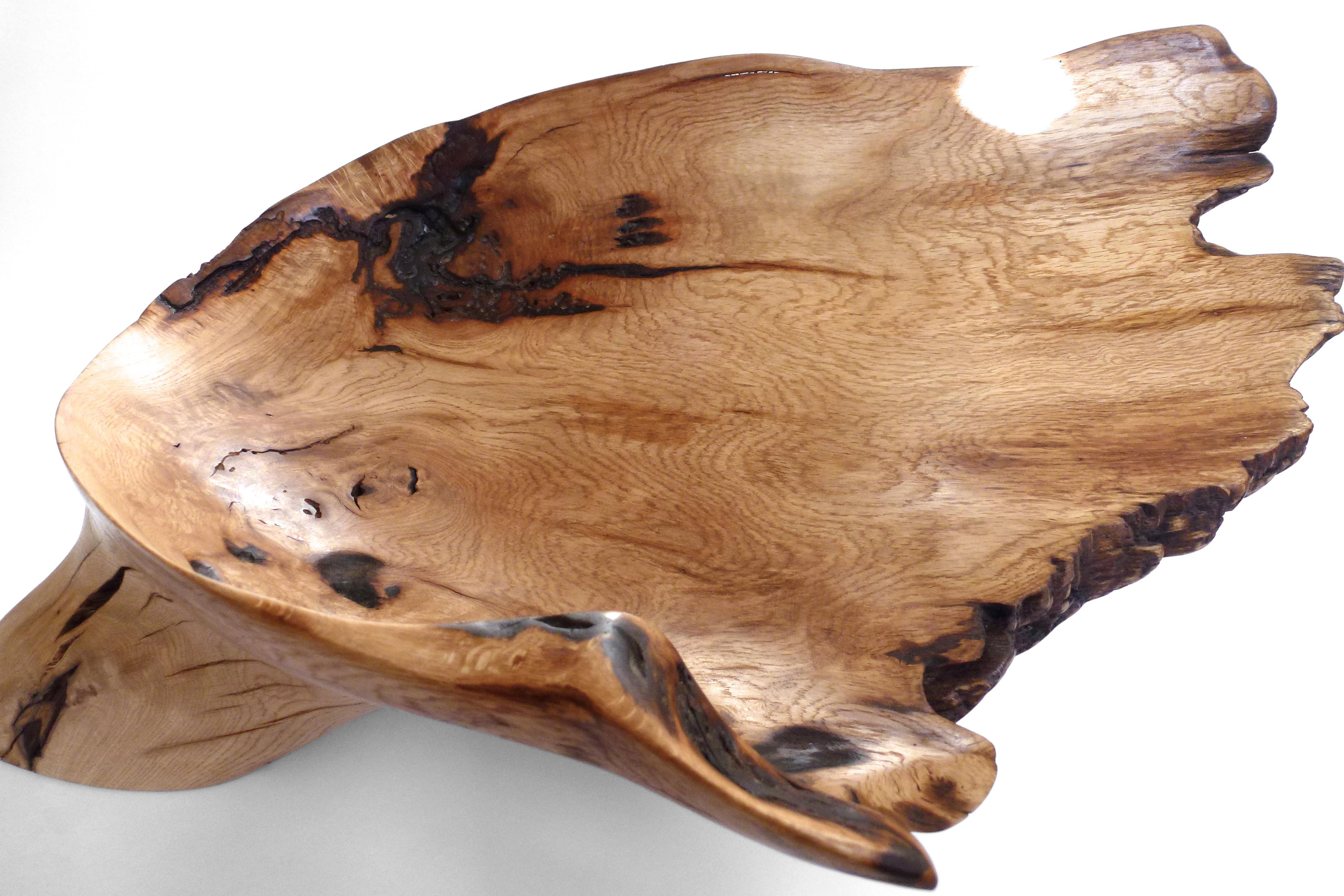 Oak Vessel 1073 by Jörg Pietschmann
Dimensions: D 54 x W 58 x H 22 cm 
Materials: Oak.
Finish: Polished oil finish.


Carved from an oak tree trunk fallen by a windbreak.
In Pietschmann’s sculptures, trees that for centuries were part of a