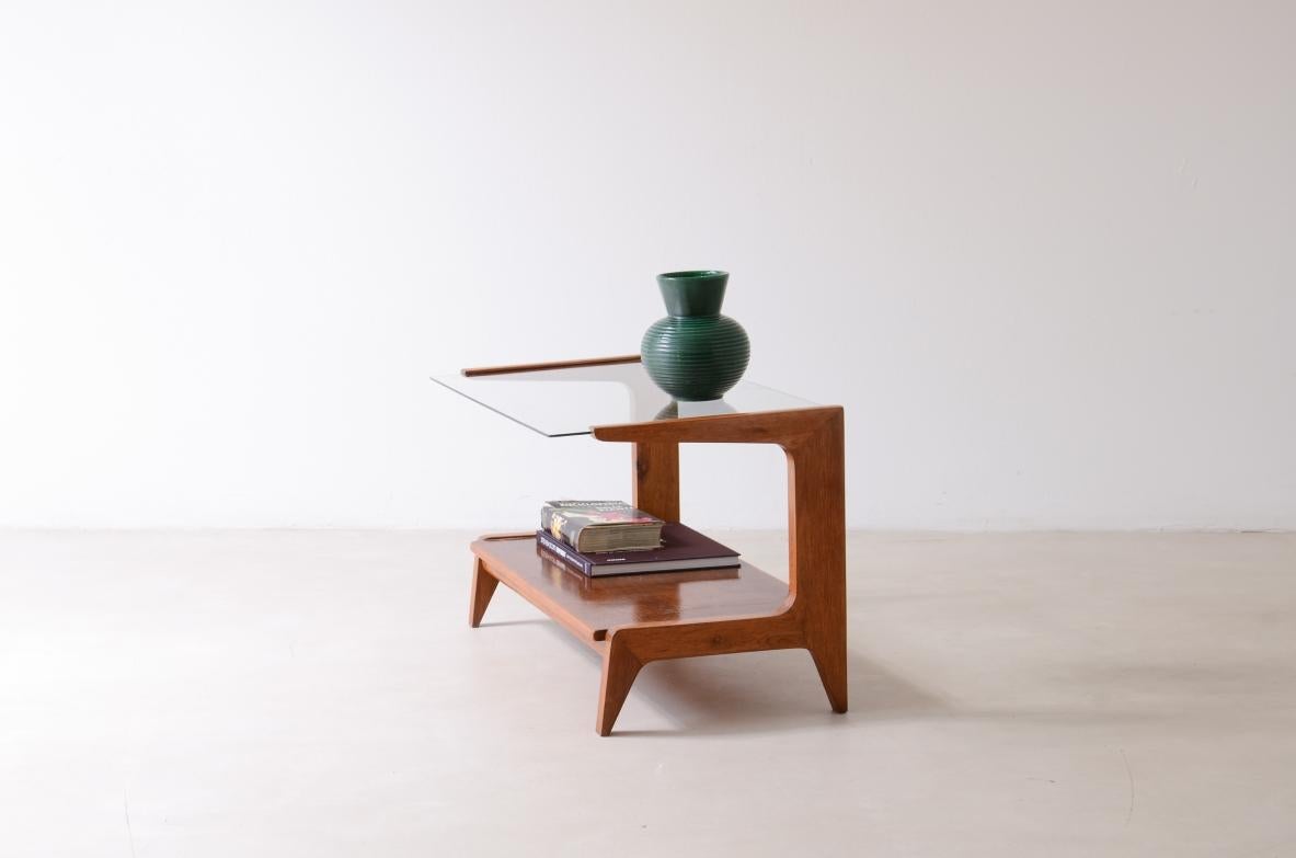 Oak wall coffee table with a cut glass top and a wooden top in the style of Gio Ponti

Italian manufacture, ca. 1950.