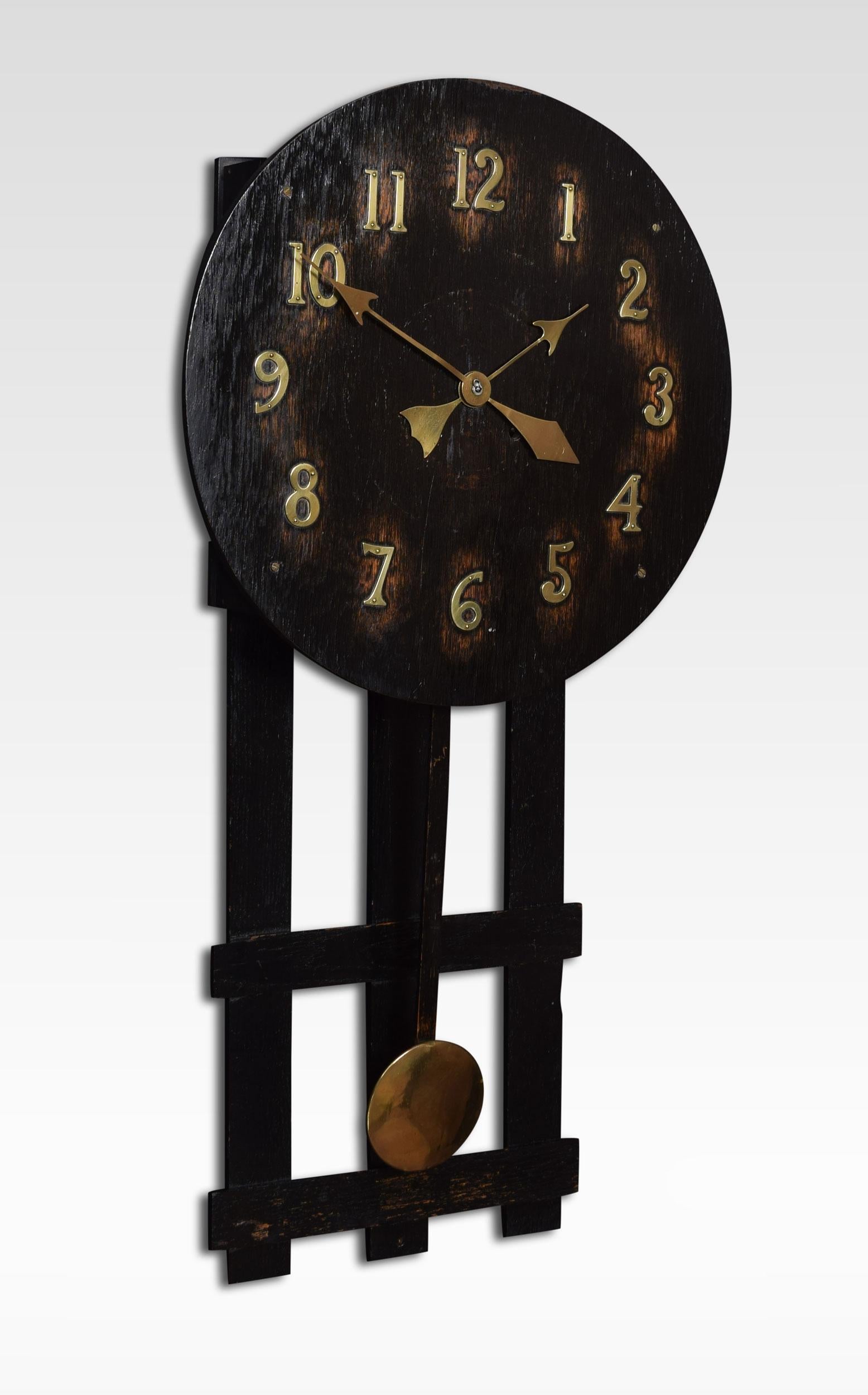 Oak missionary clock, the circular dial with Arabic numerals. To the movement striking on a gong, with stylized drop pendulum.
Dimensions:
Height 31 inches
Width 15.5 inches
Depth 4 inches.