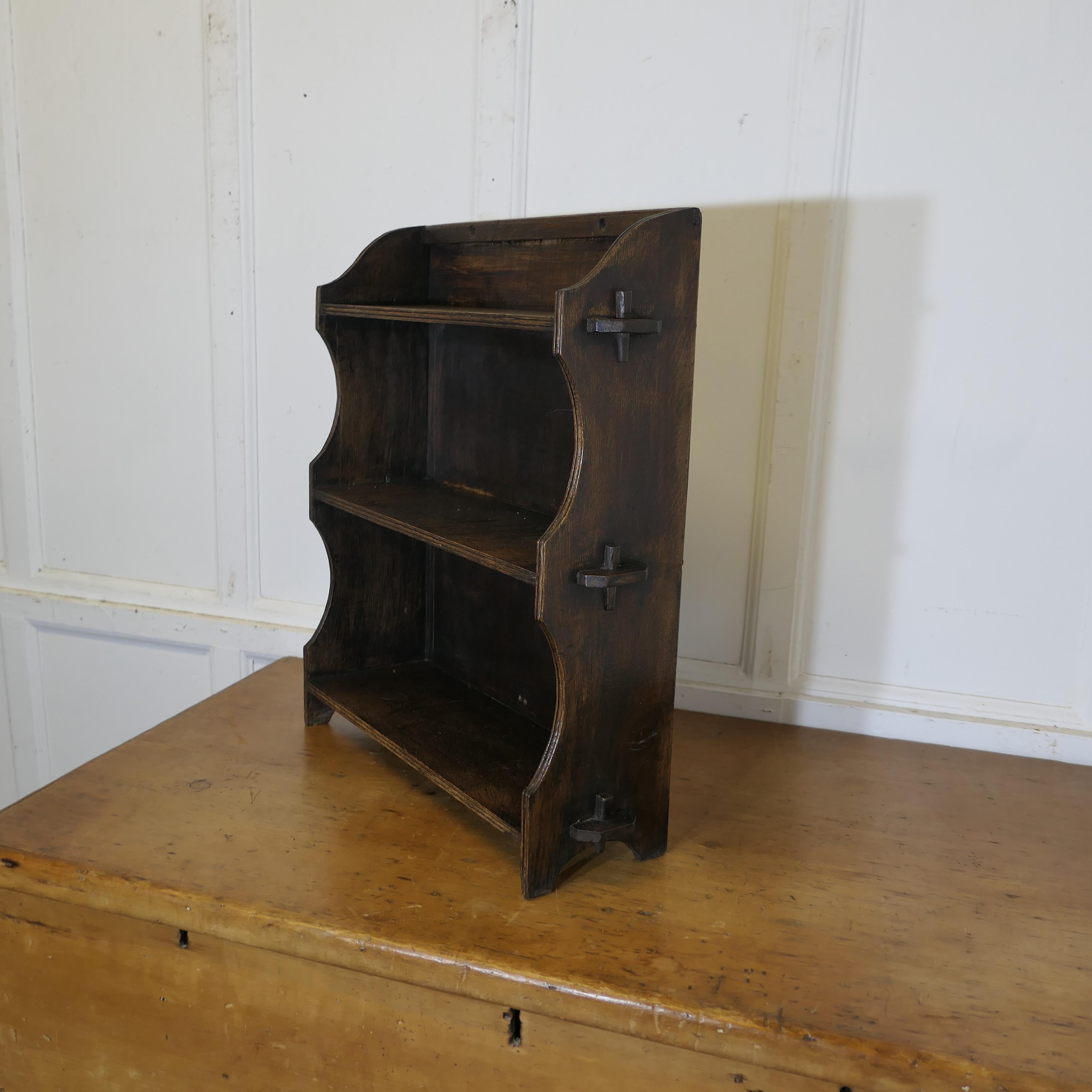 Early 20th Century Oak Wall Hanging Shelf    This charming little shelf unit has a solid back