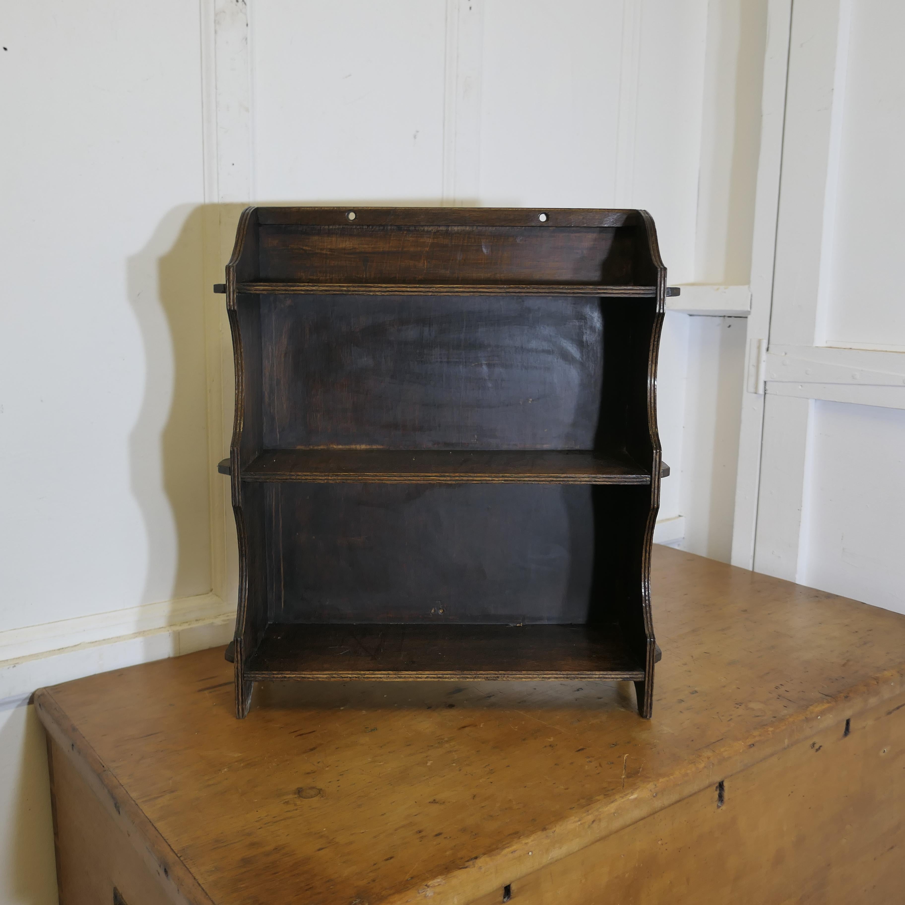 Oak Wall Hanging Shelf    This charming little shelf unit has a solid back 1