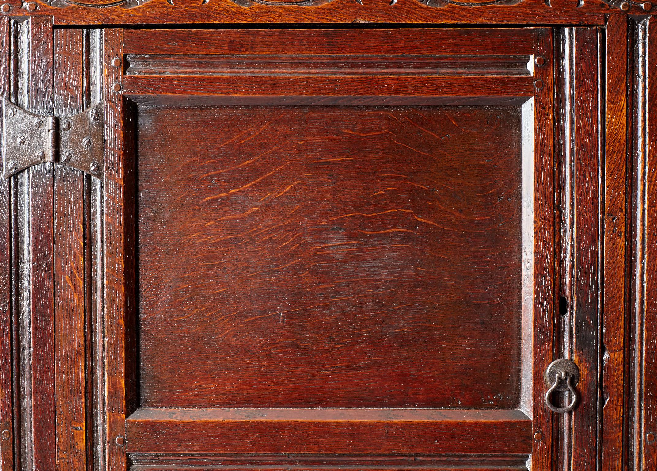 Carved Oak Wardrobe / Clothes Press, Charles II period, Lancashire, circa 1670-1680 For Sale