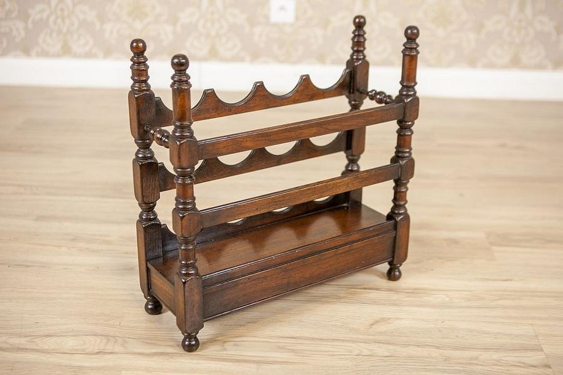 Oak Wine Rack from the Early 20th Century in Dark Brown

We present you an oak wine rack from the Interwar Period. It is composed of three shelves and a drawer.
The rack can hold up to 12 bottles.
This item is after restoration and finished in wax.