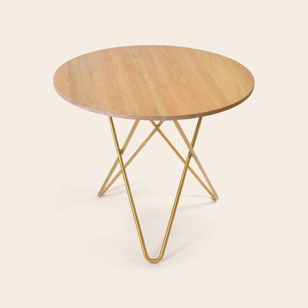 Oak Wood and Brass Dining O Table by OxDenmarq
Dimensions: D 80 x H 72 cm
Materials: Brass, Oak Wood
Also Available: Different top and frame options available

OX DENMARQ is a Danish design brand aspiring to make beautiful handmade furniture,