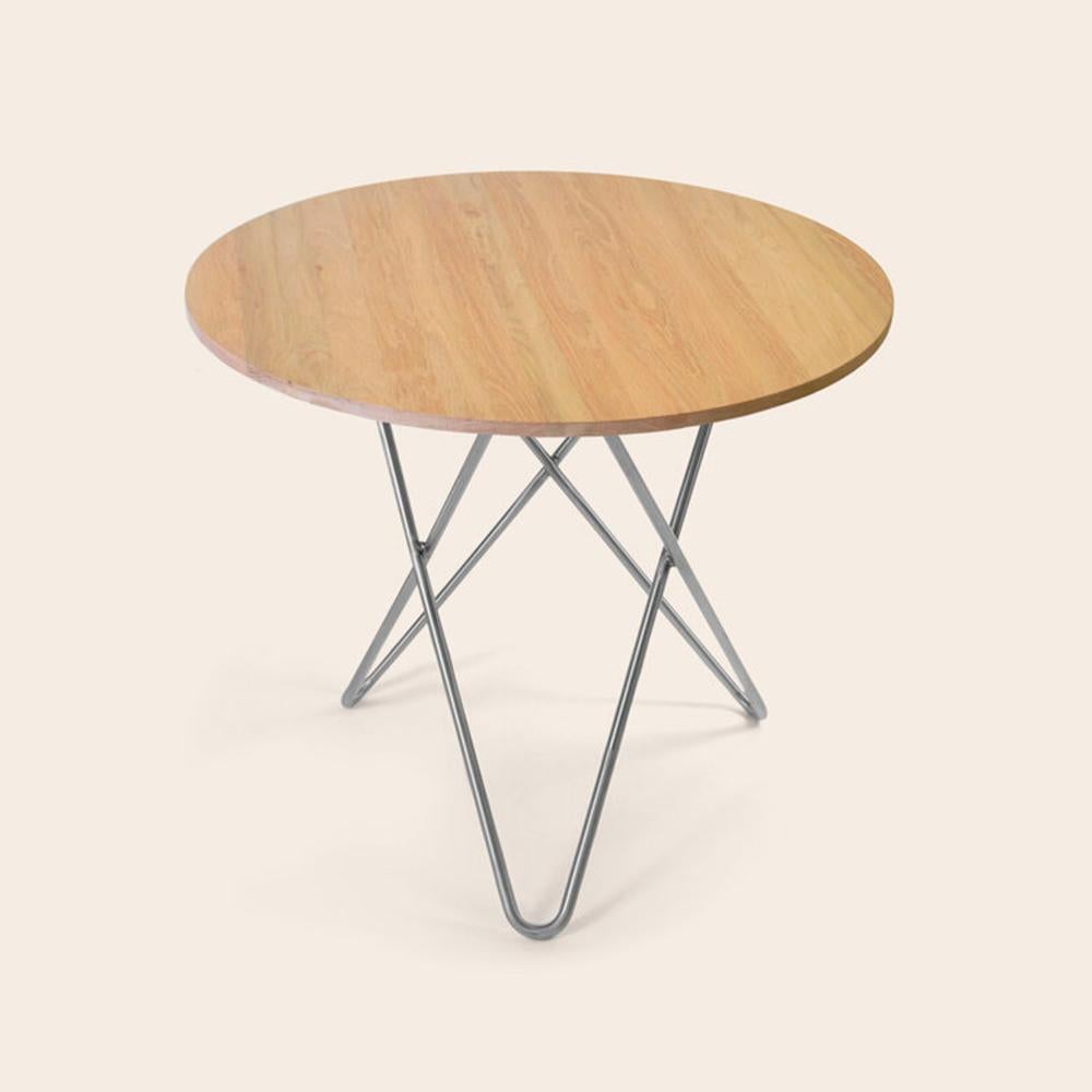 Oak Wood and Steel Dining O Table by OxDenmarq
Dimensions: D 80 x H 72 cm
Materials: Steel, Oak Wood
Also Available: Different top and frame options available,

OX DENMARQ is a Danish design brand aspiring to make beautiful handmade furniture,
