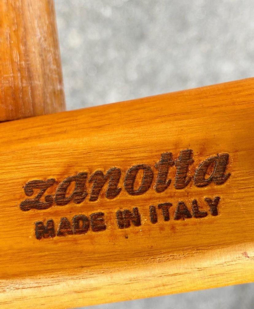 Rare 'Oasis' safari chair designed in 1968 by Franco Legler for the famous Italian factory Zanotta. The chair has a solid ash structure, canvas seat and backrest and leather armrest. As the majority of safari chair, this chair has no fixed joint so