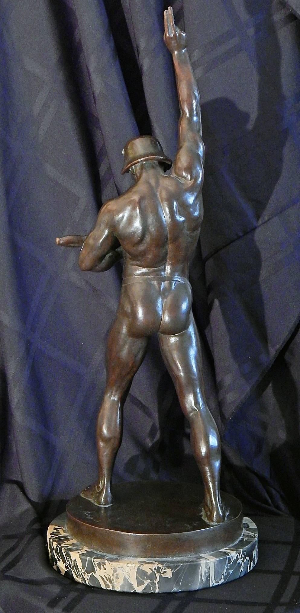 An extraordinary and very rare example of Art Deco memorial sculpture, this depiction of a nude soldier -- clothed with nothing but his metal helmet and a loincloth -- was created by Paul Juckoff-Skopau for Kyffhäuserhütte Artern, a mechanical