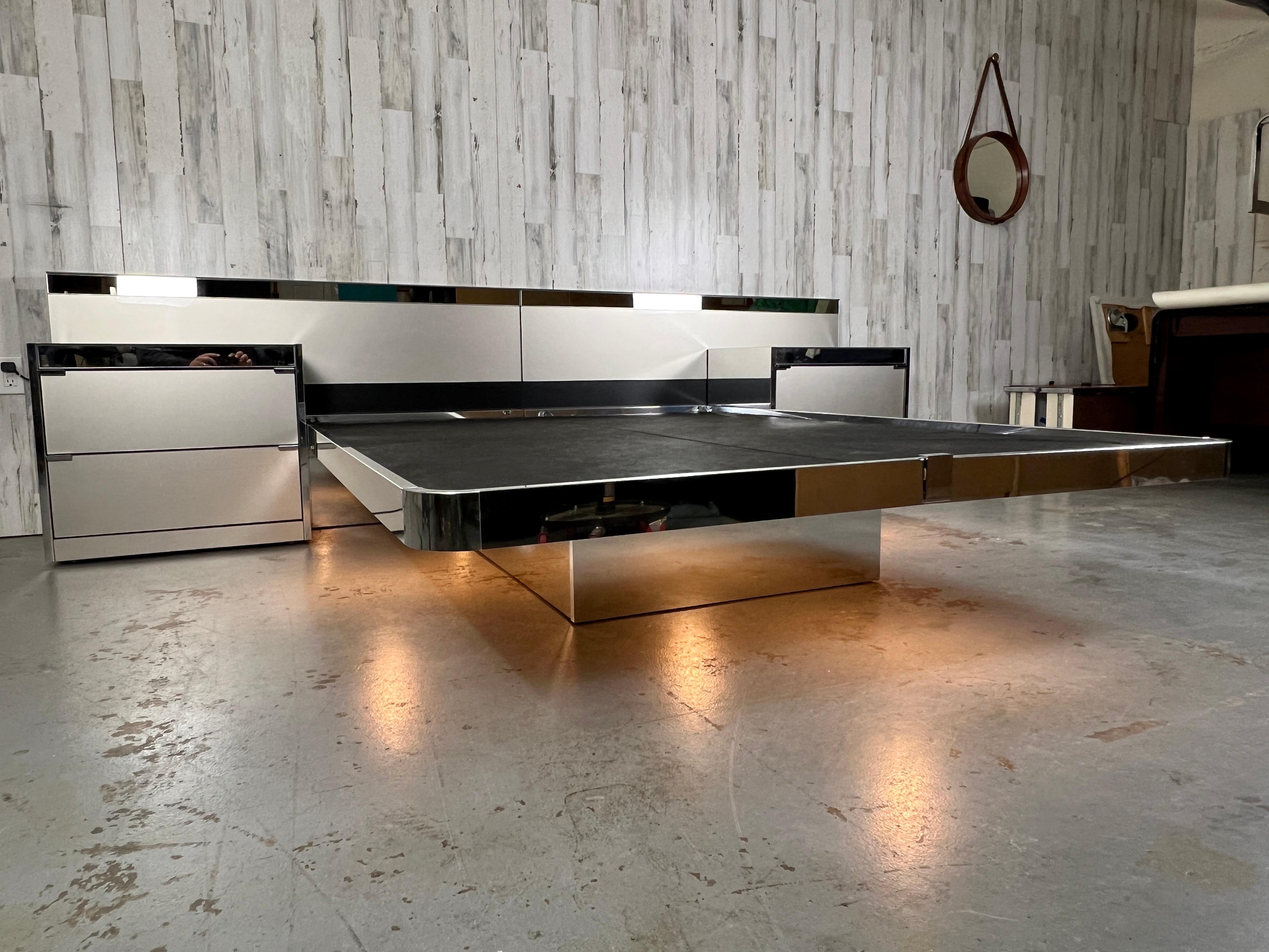 O.B. Solie for Ello Chrome & pirror Platform bed Queen Size. Silver shimmery lacquered glass that is accompanied by chrome. Show stopping lights under the platform bed. This bed is as extra as it gets! Very rare and hard to find a set like this in
